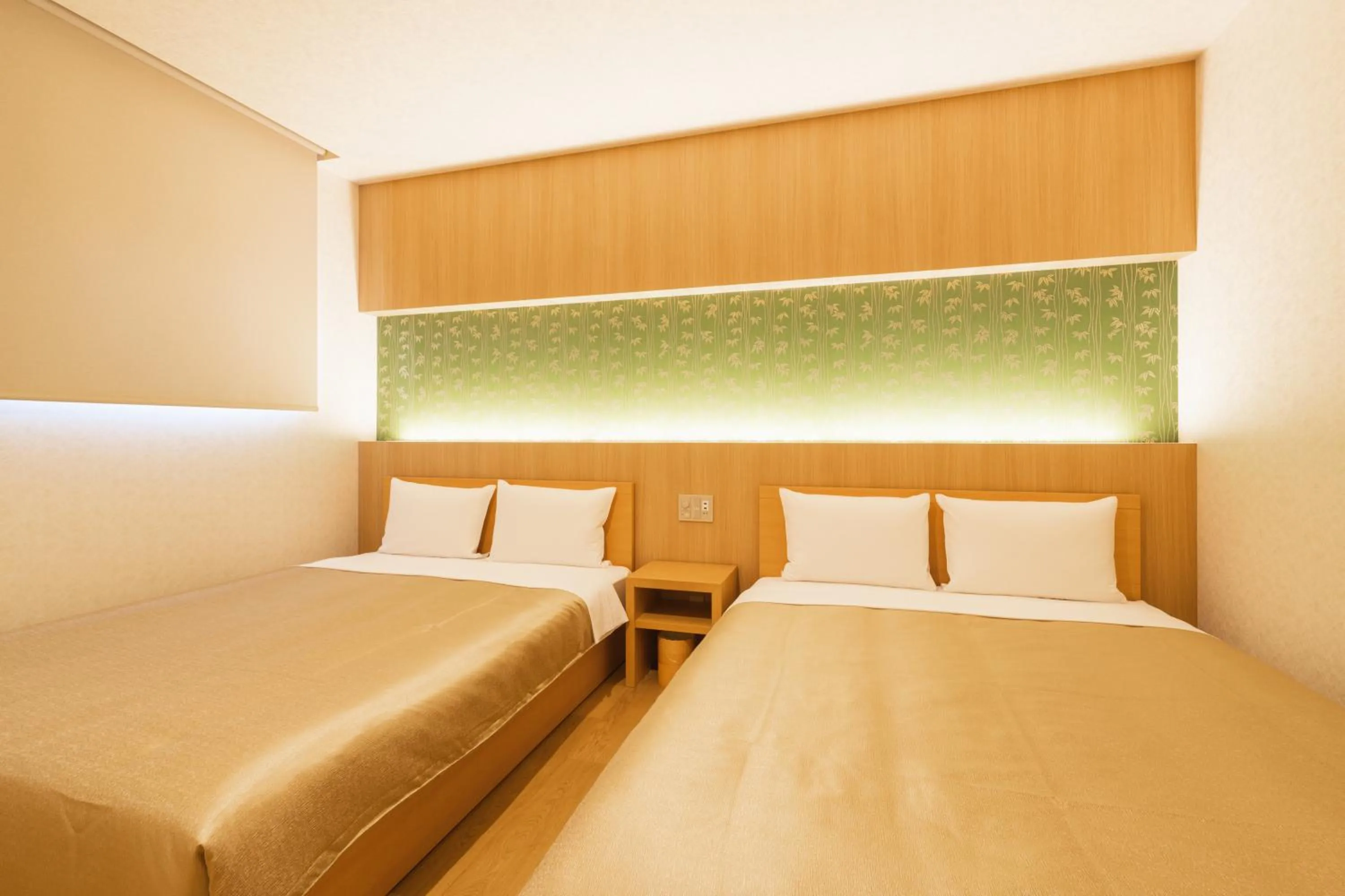 Bed in GRAND BASE Hakata Gofuku