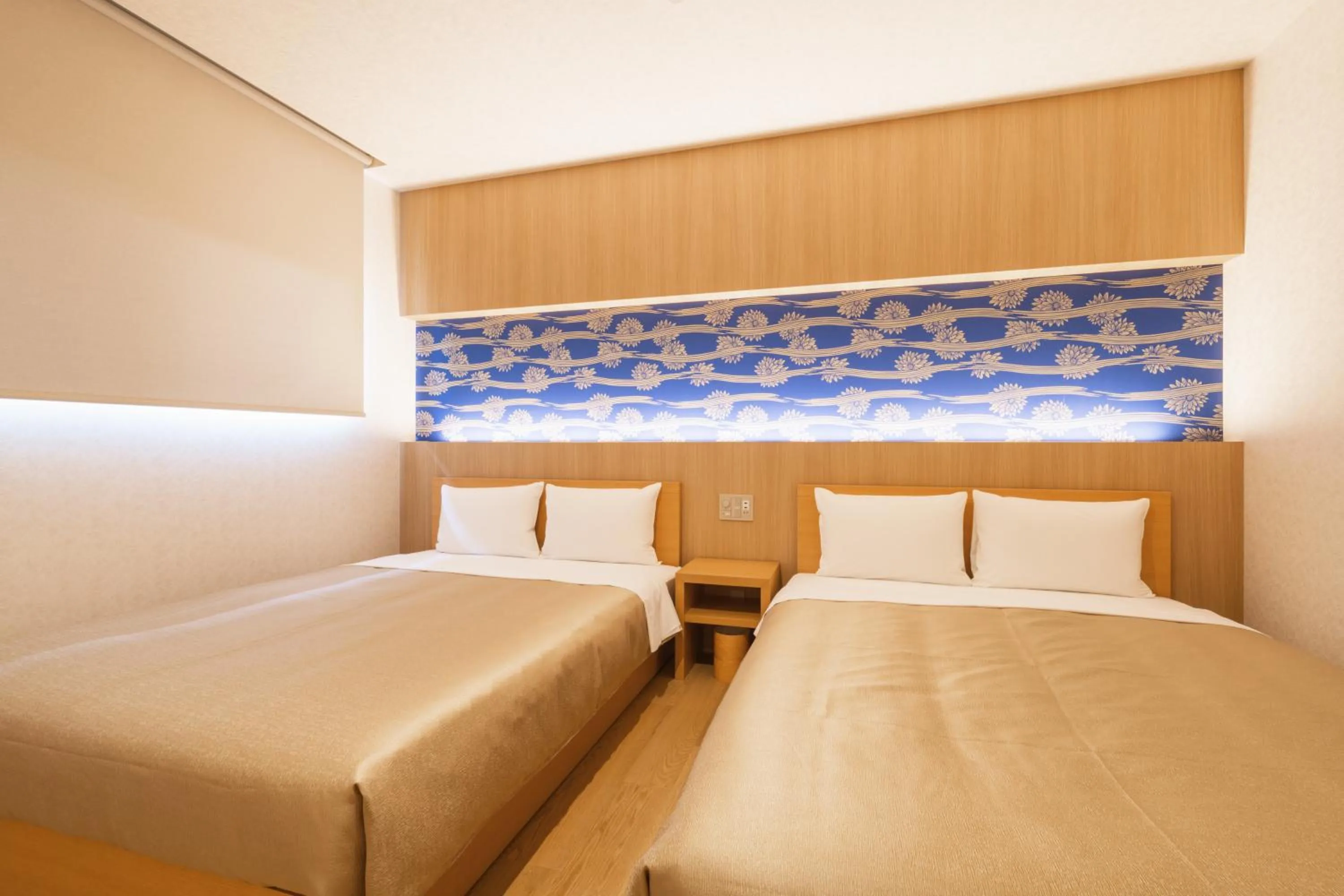 Bed in GRAND BASE Hakata Gofuku
