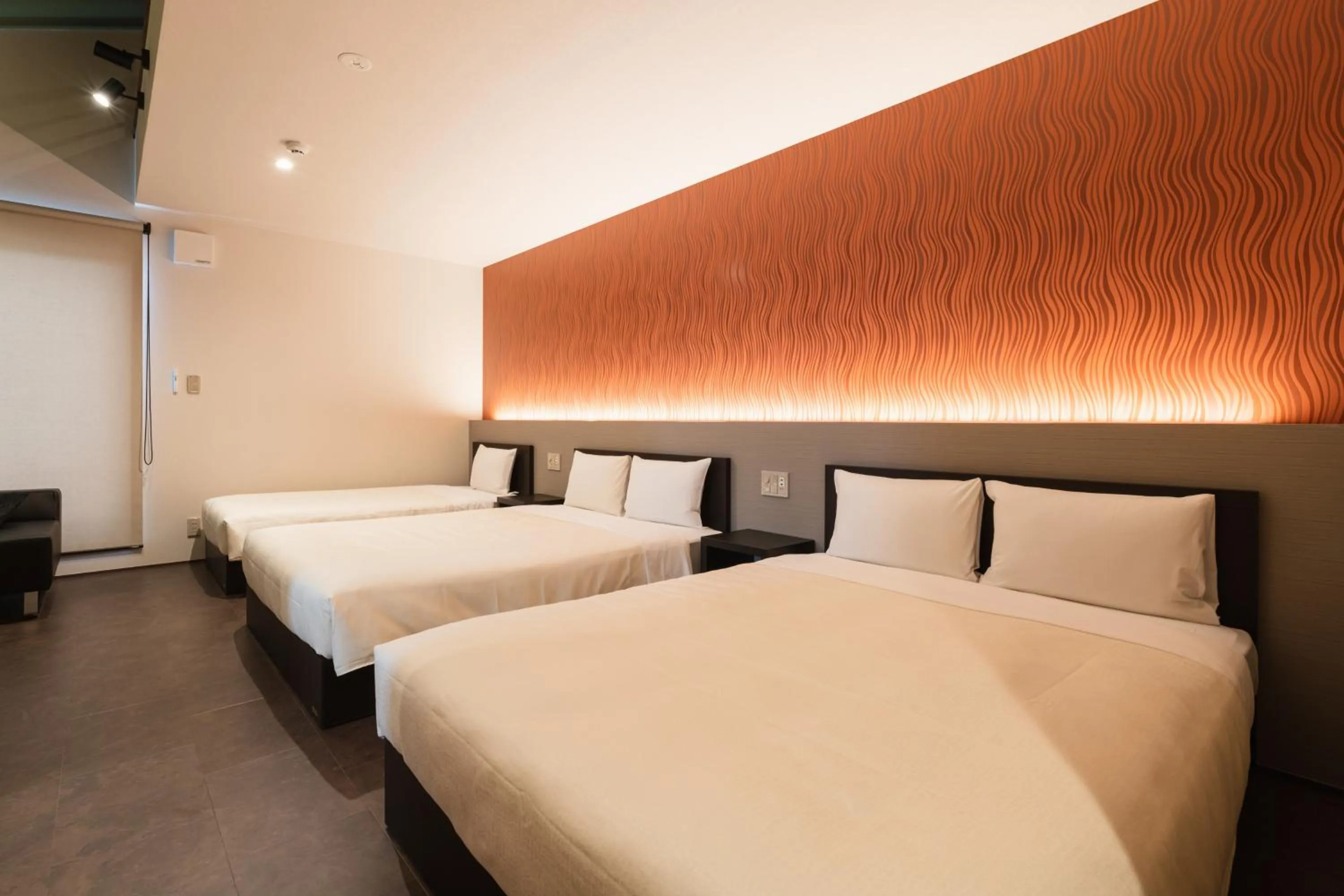 Bed in GRAND BASE Hakata Gofuku