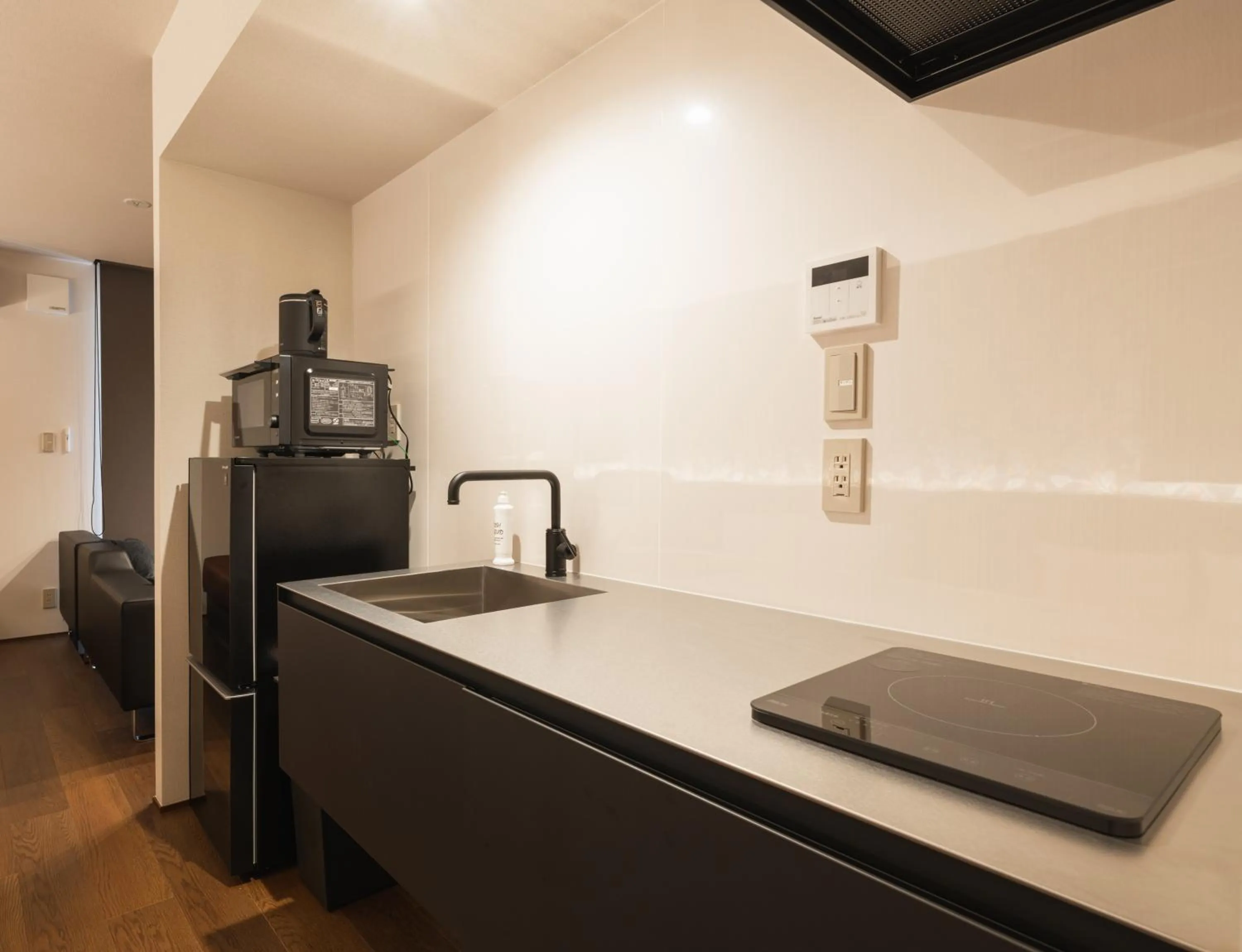 Kitchen or kitchenette in GRAND BASE Hakata Gofuku