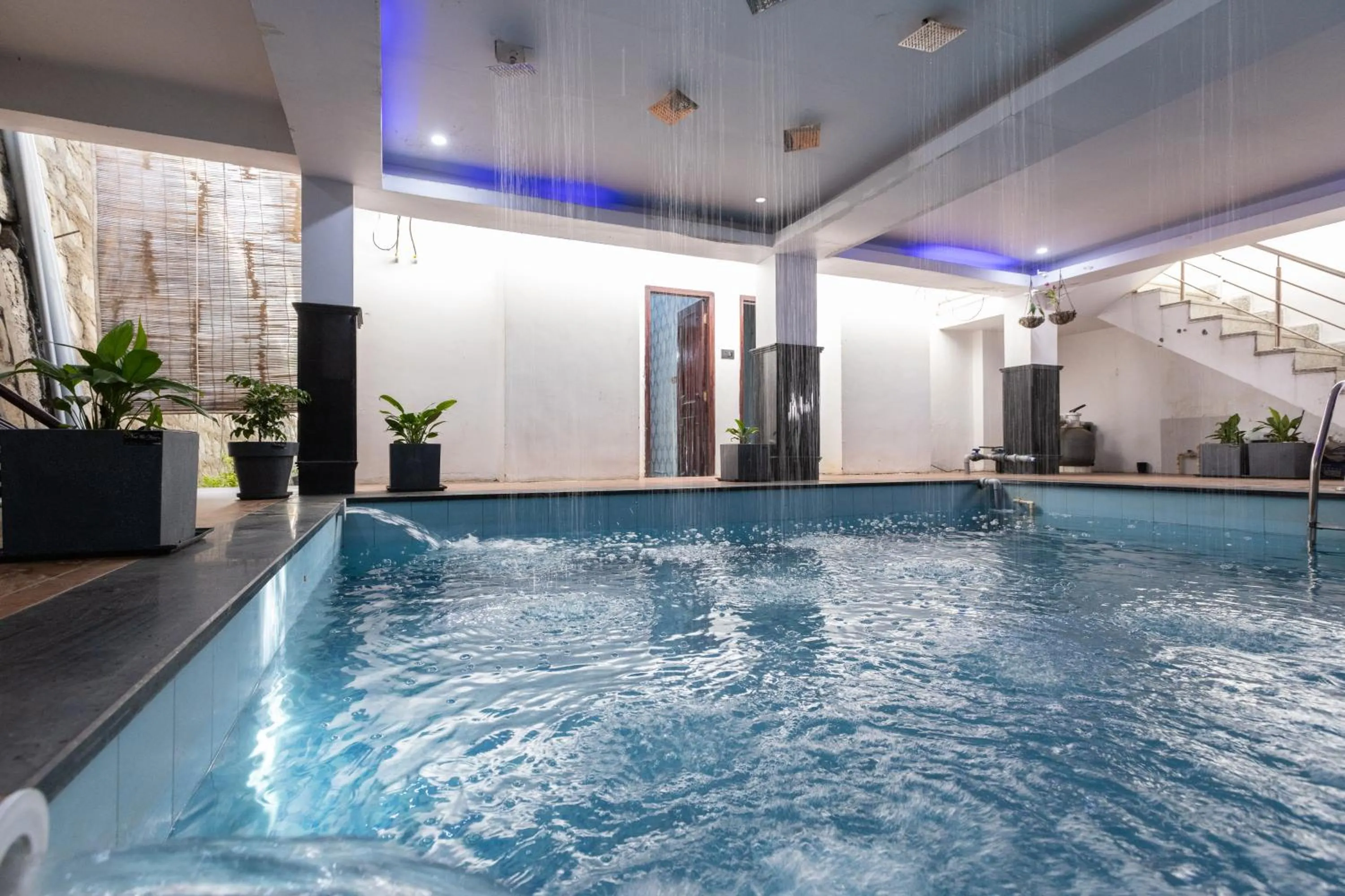 Swimming pool in The Bougainvillea Retreat - A Luxury Private Pool Villa in Dehradun