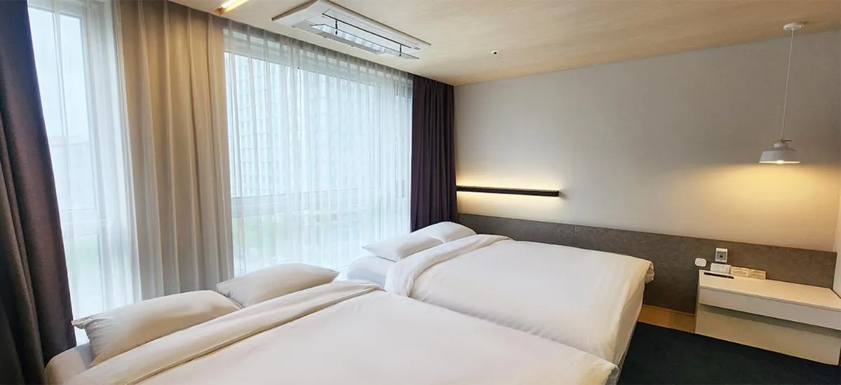 Bed in Grand City Hotel Changwon