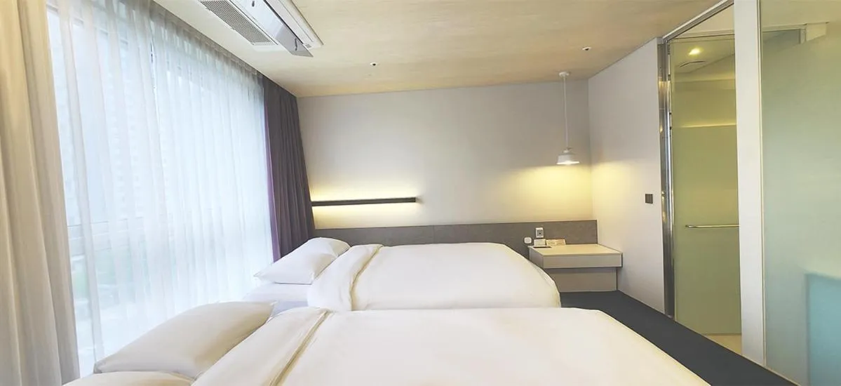 Bed in Grand City Hotel Changwon
