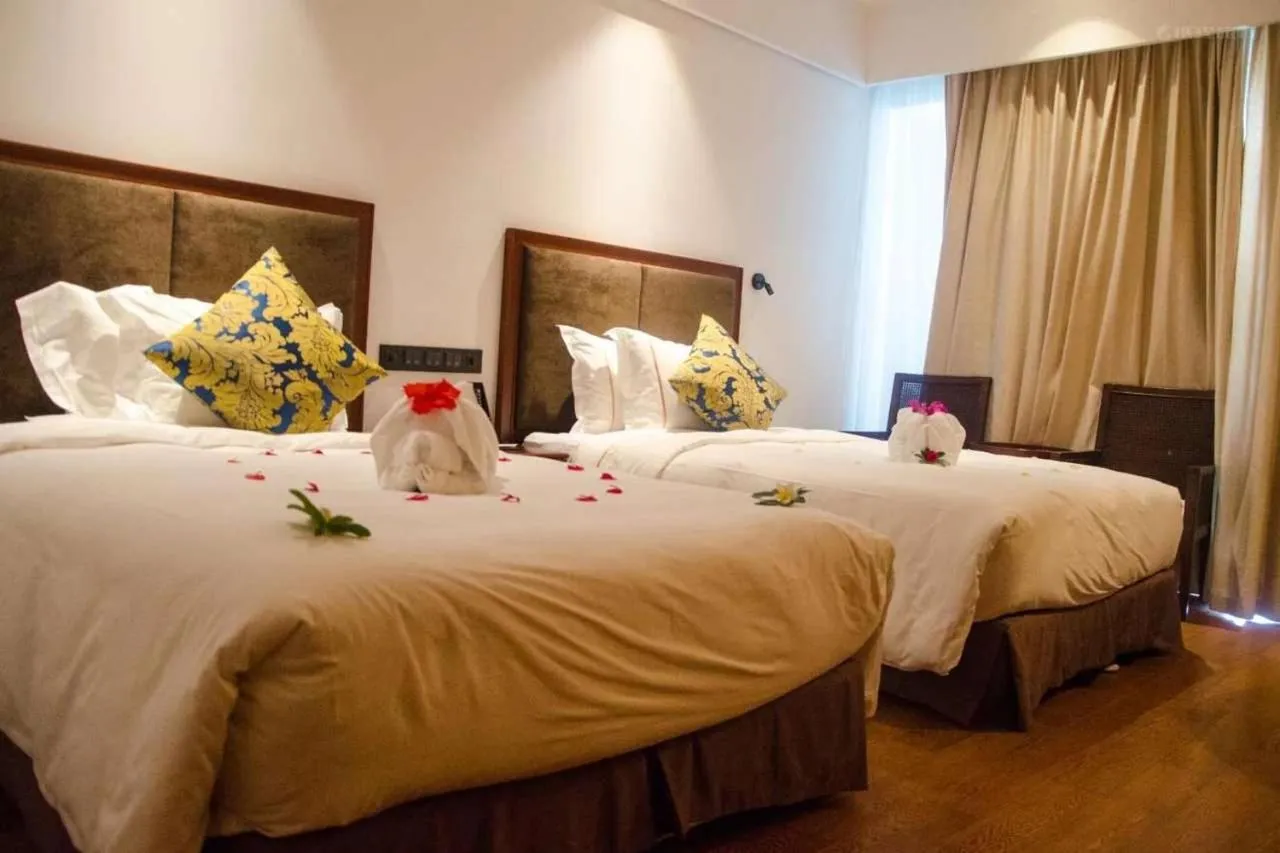 Bed in Wyndham Garden Lingshui