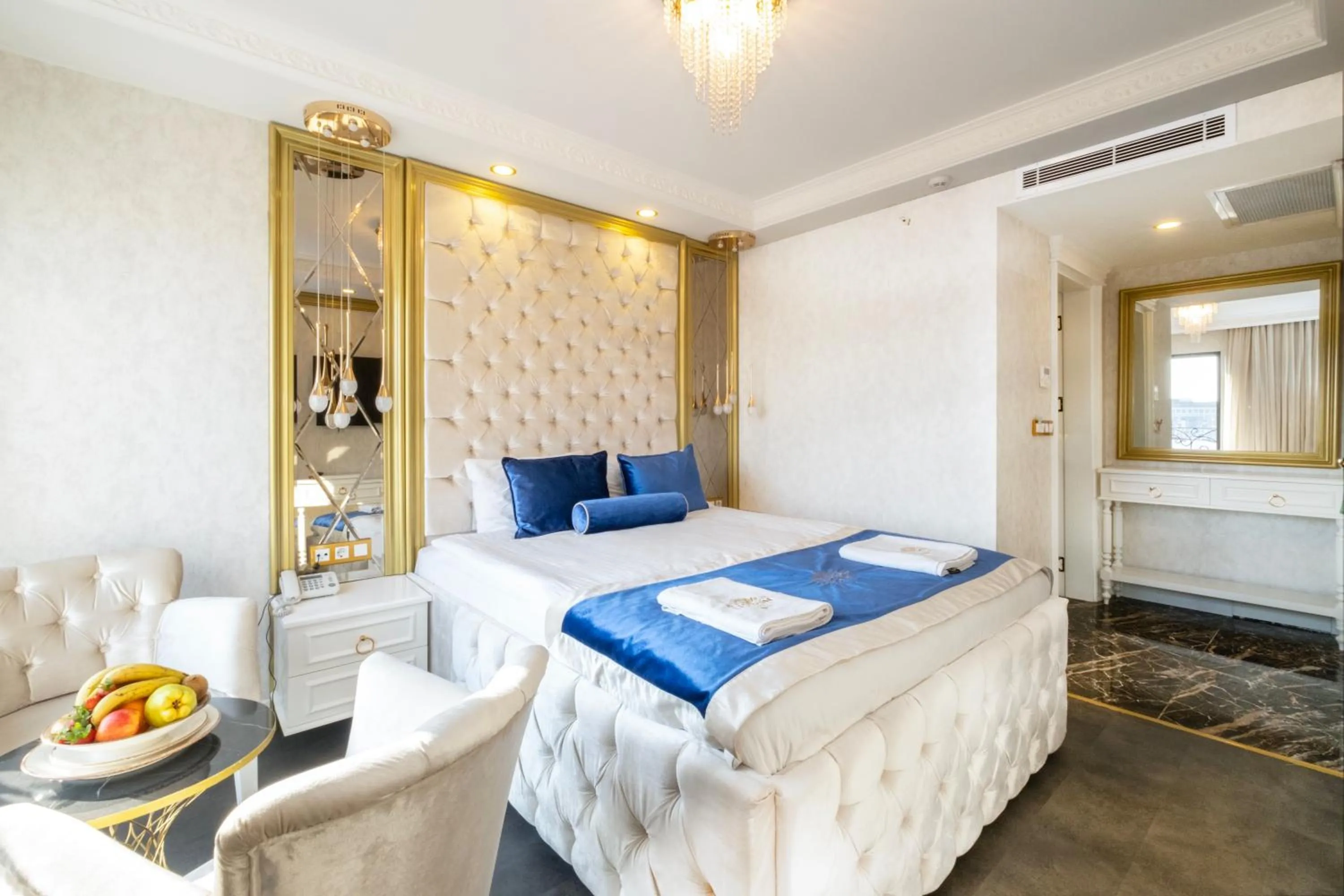 Bed in Leslion Luxury Hotel