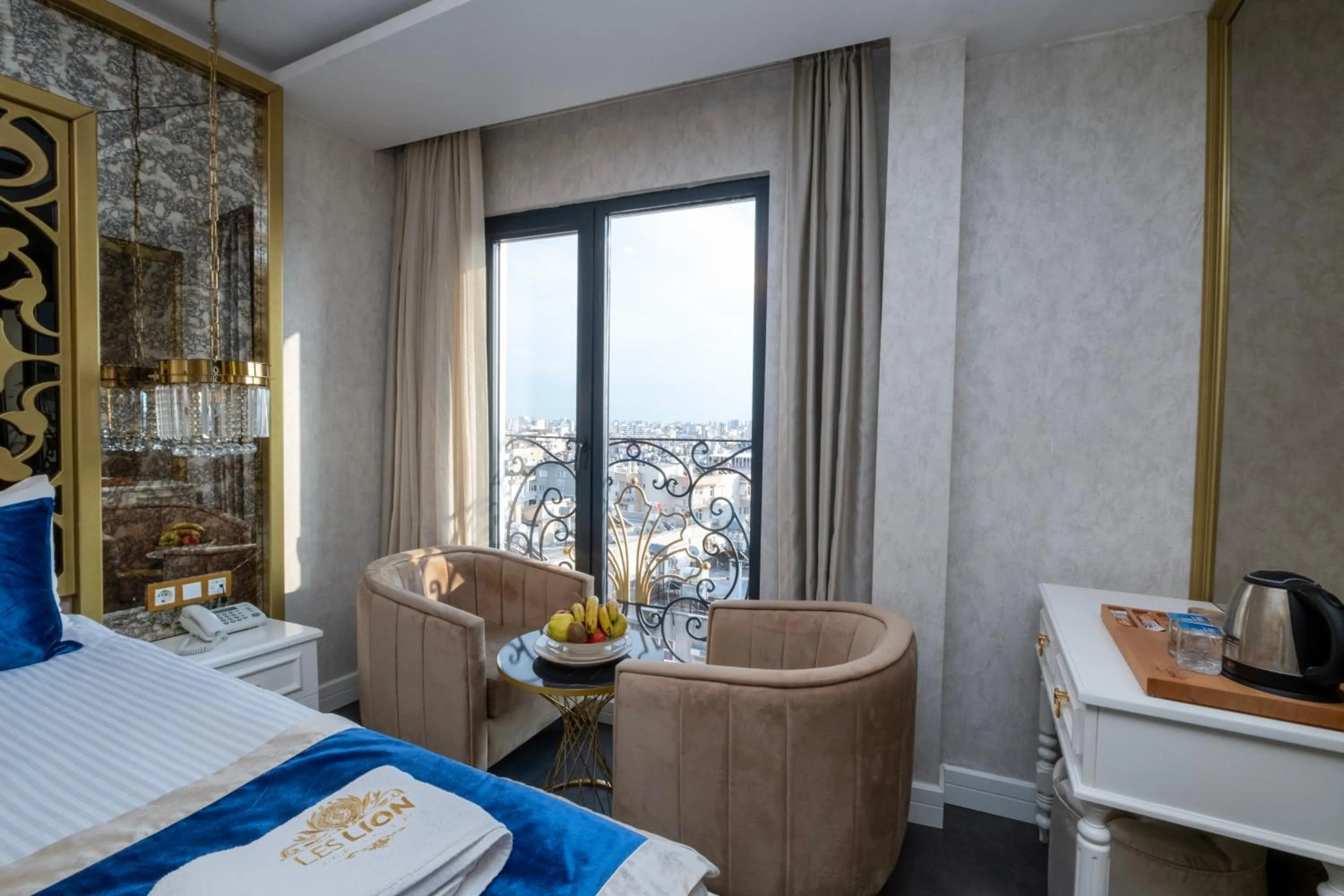 Bed in Leslion Luxury Hotel