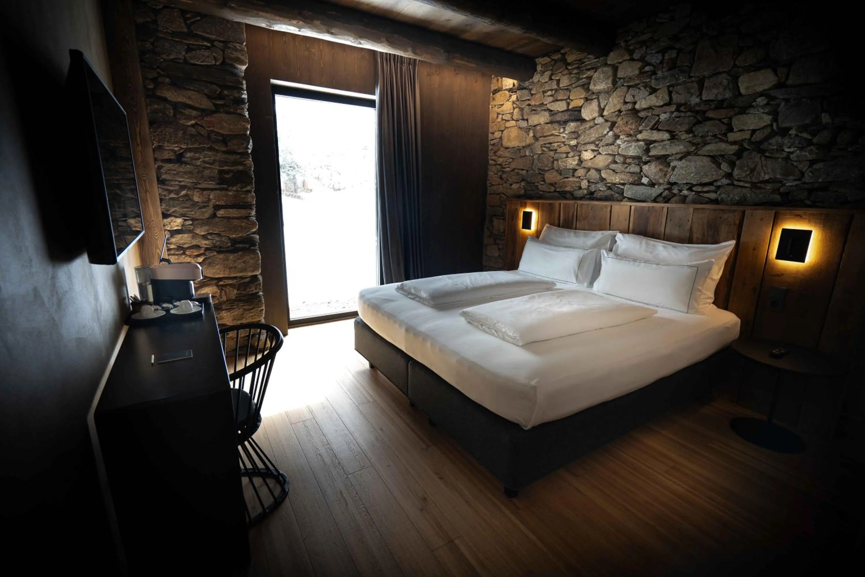 Bed in Les Pardines 1819 Mountain suites & SPA