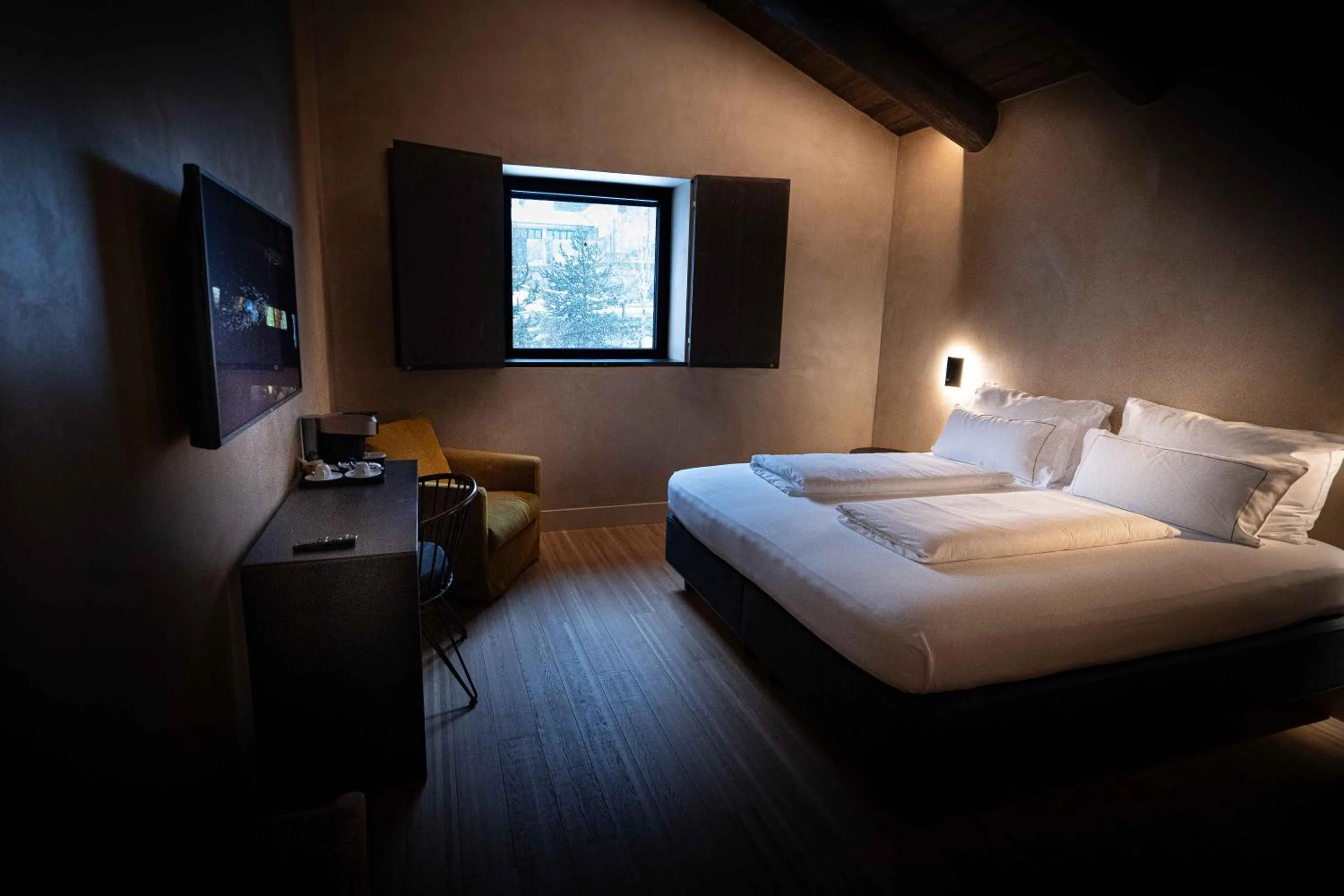 Bed in Les Pardines 1819 Mountain suites & SPA