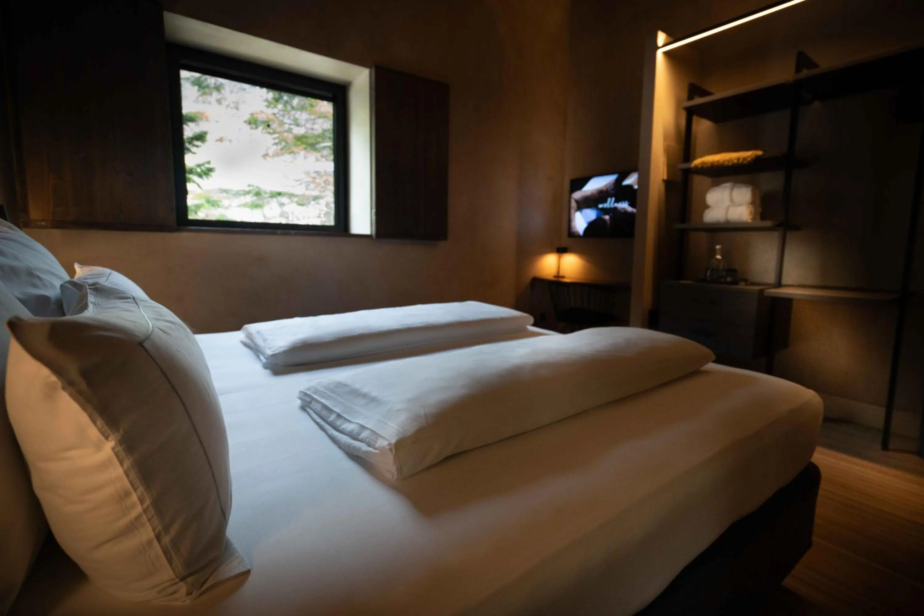 Bed in Les Pardines 1819 Mountain suites & SPA