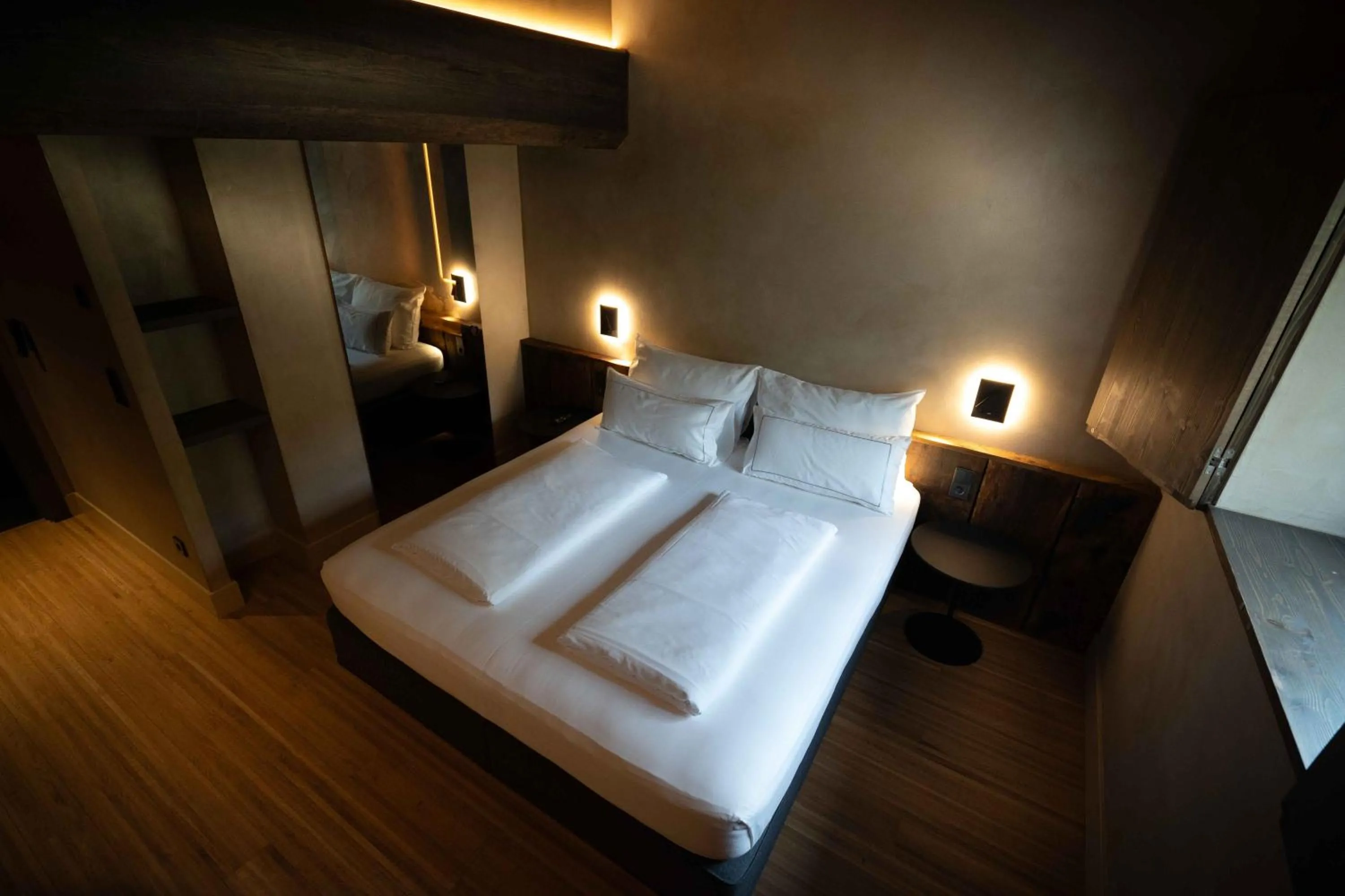Bed in Les Pardines 1819 Mountain suites & SPA