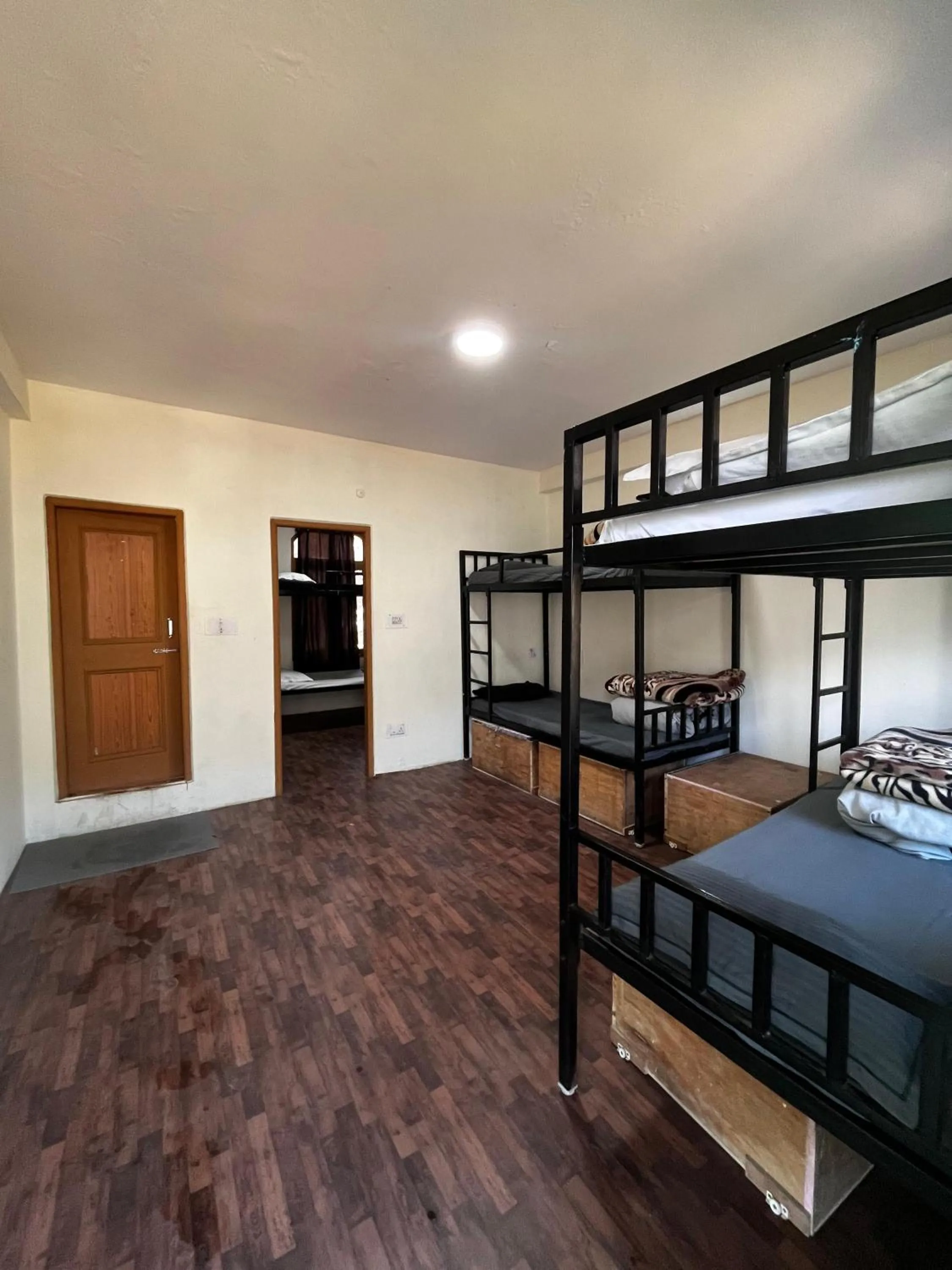 Bed in Nomadic Den Manali