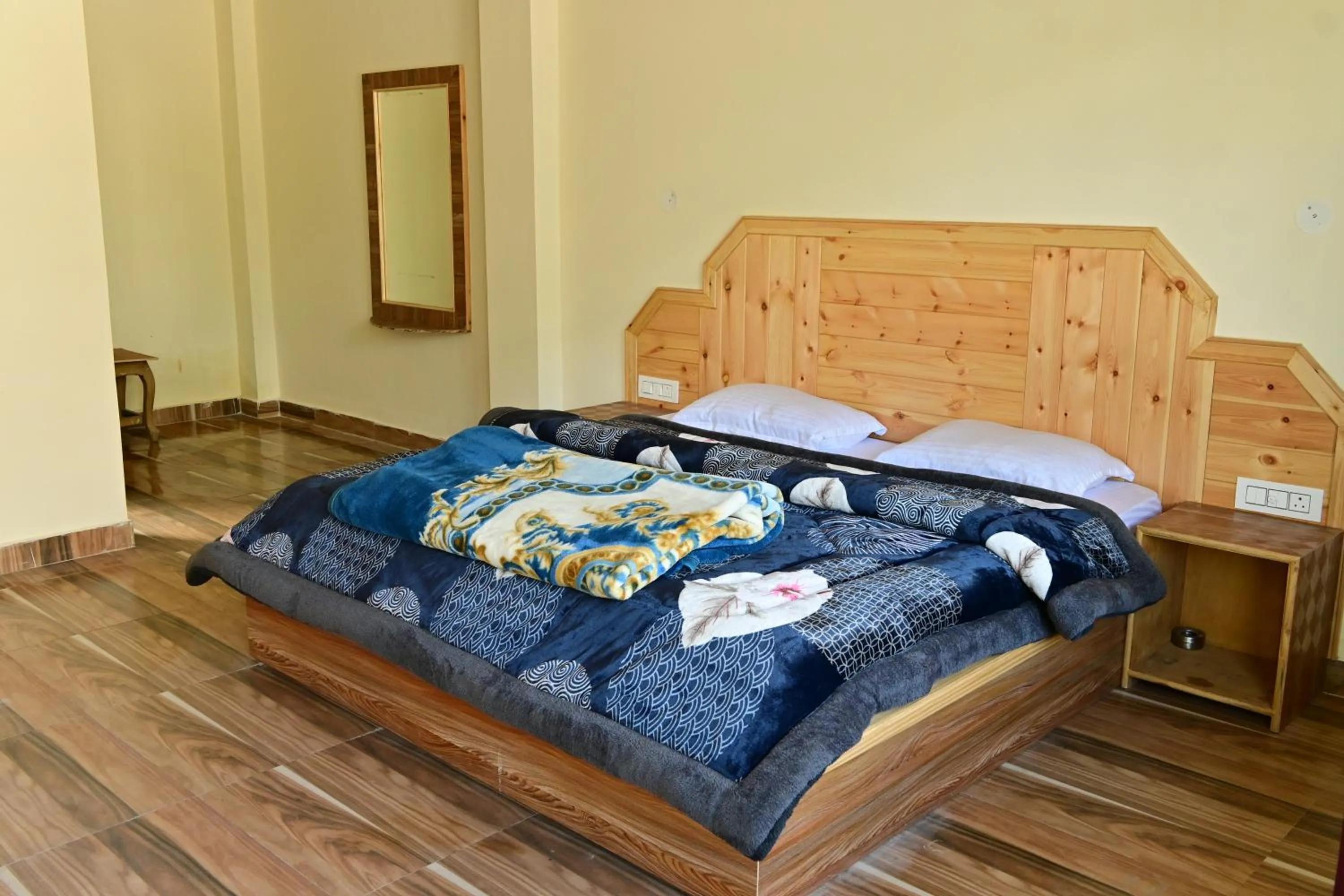 Bed in Nomadic Den Manali