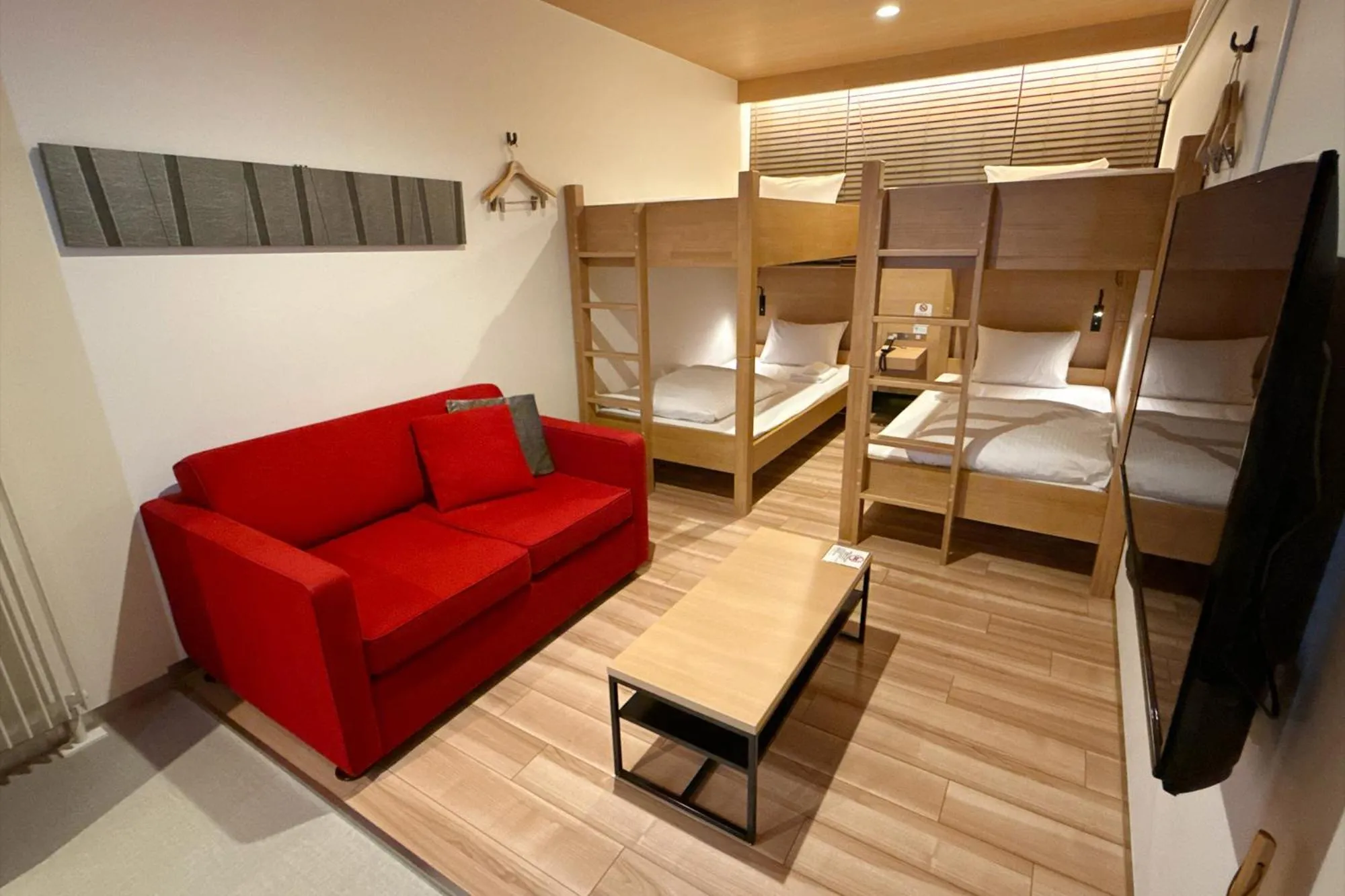 Photo of the whole room, Bed in TORIFITO HOTEL&POD NISEKO