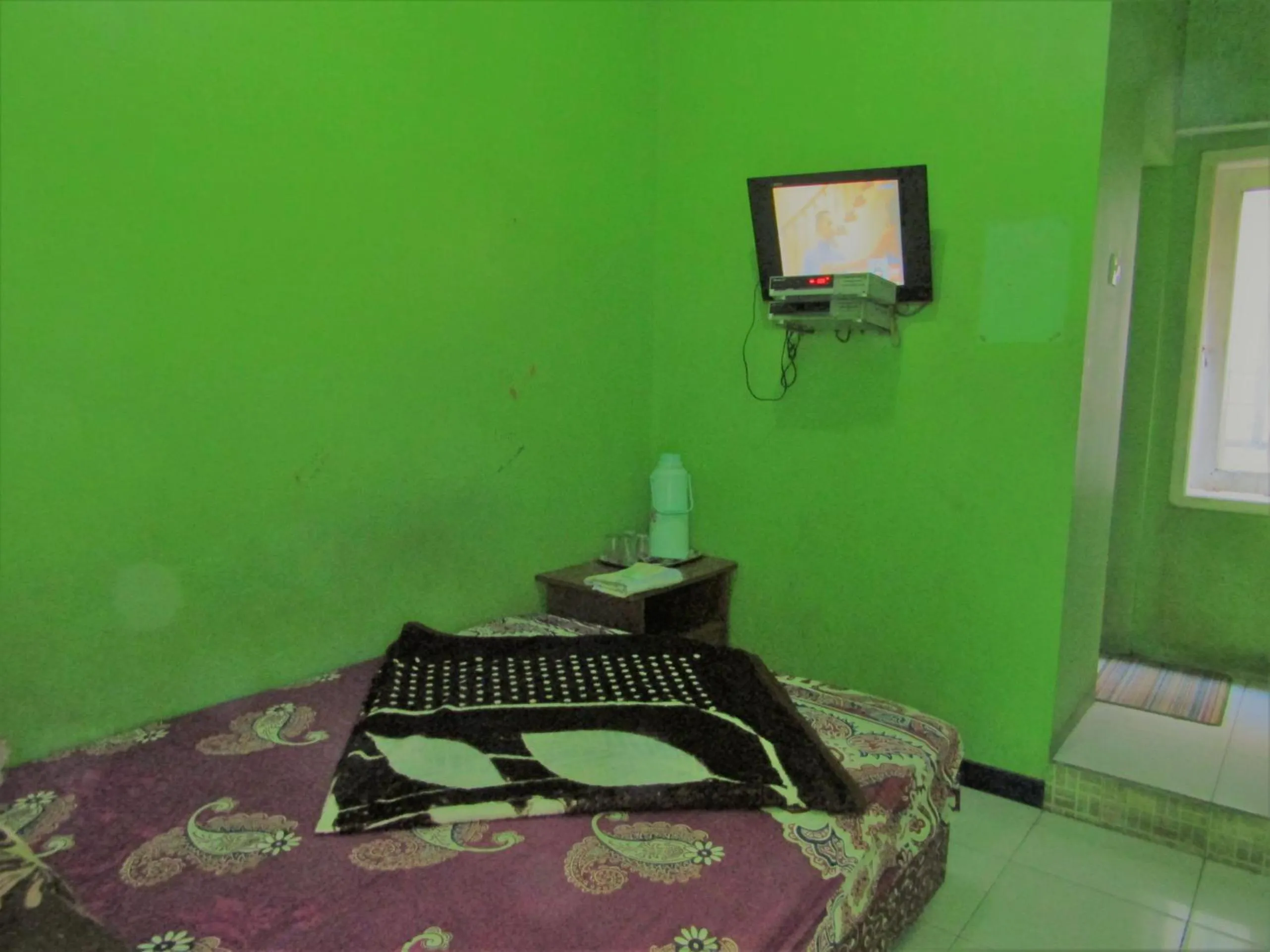 Property building, Bed in Hotel Nirmala