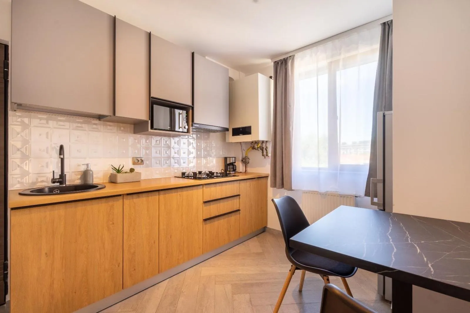 Kitchen or kitchenette in Urbio Private Suites