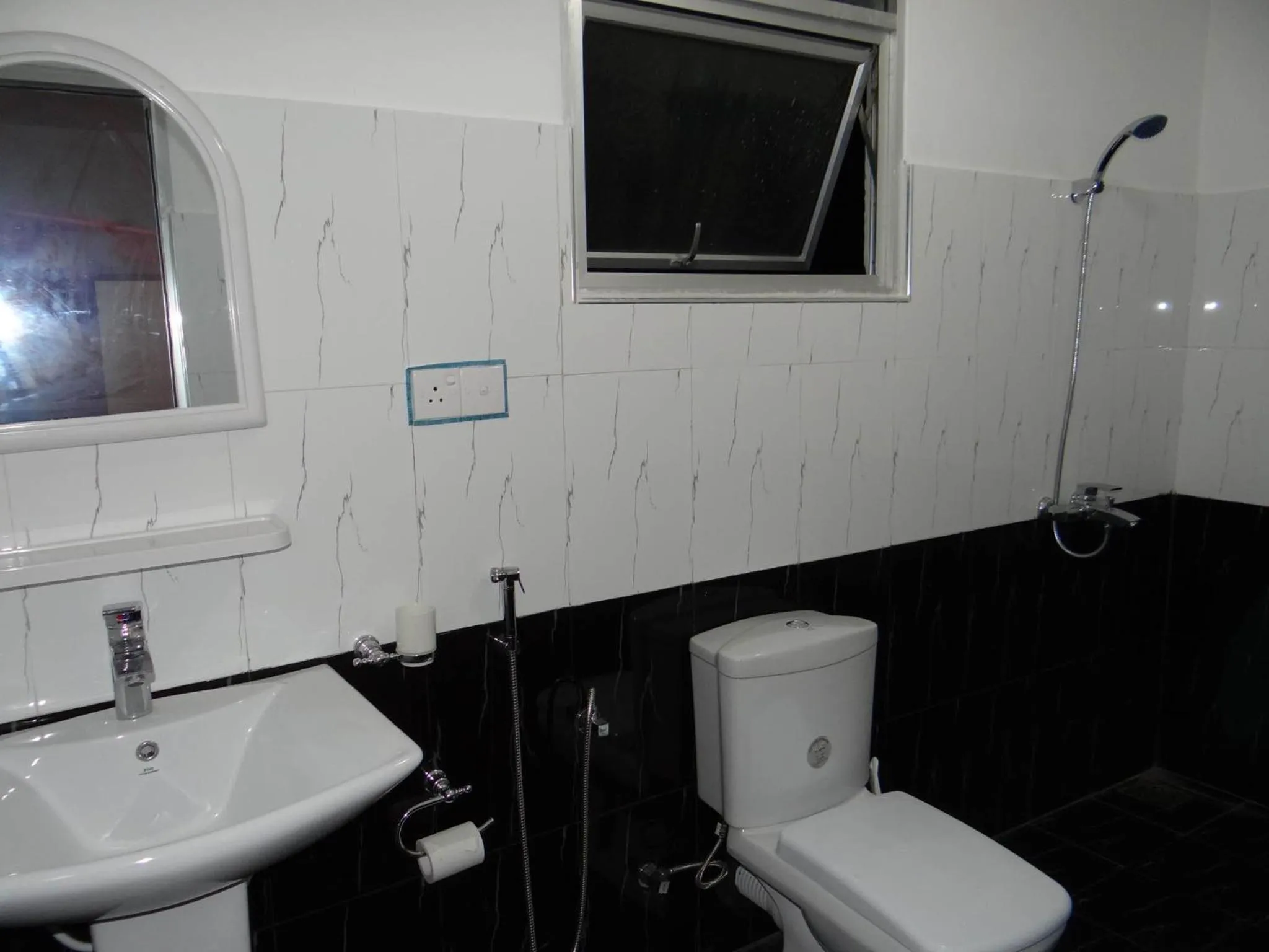 Bathroom in New Rani Inn