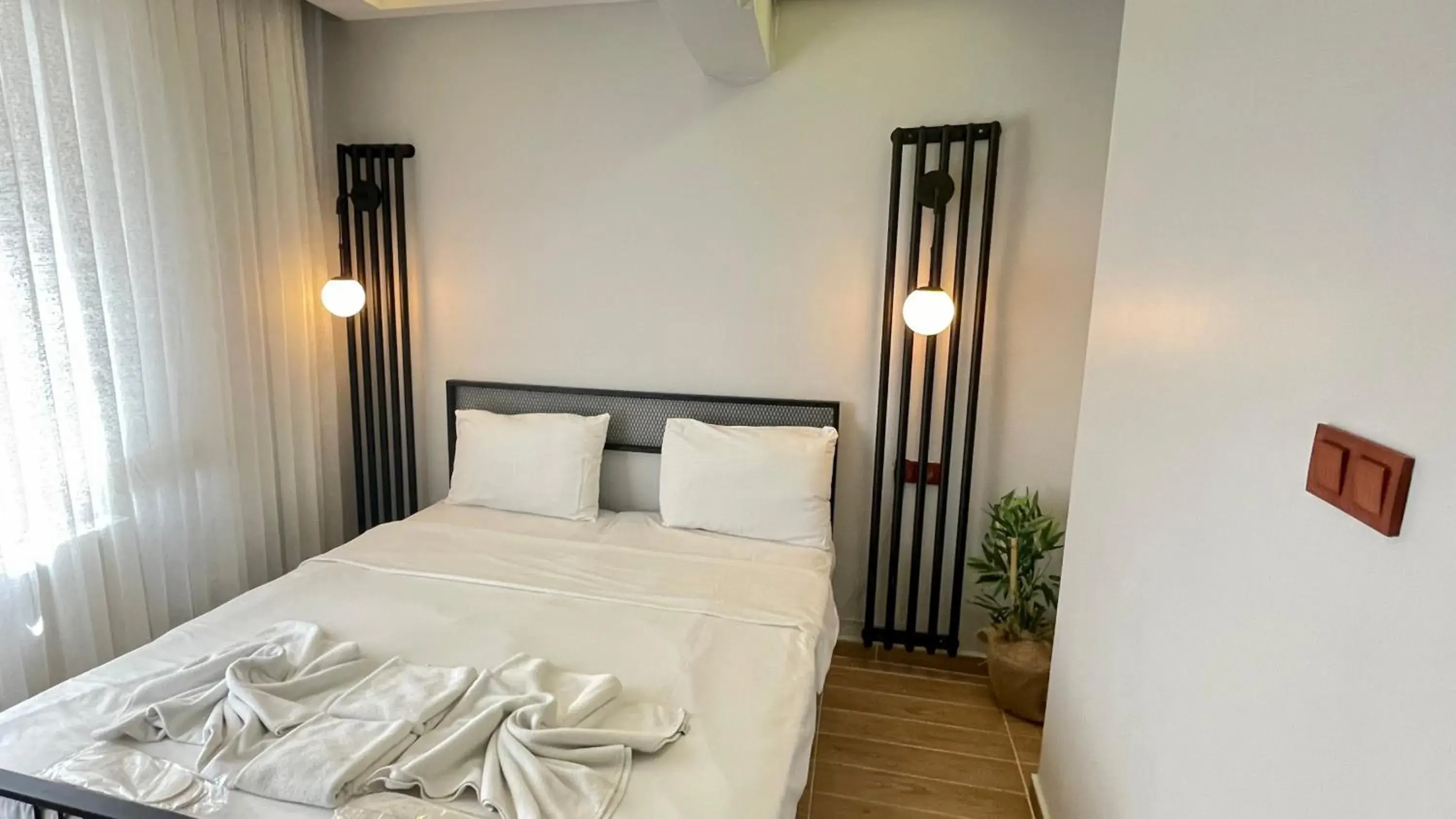 Bed in Ora Bella Hotel Bed in Ora Bella Hotel