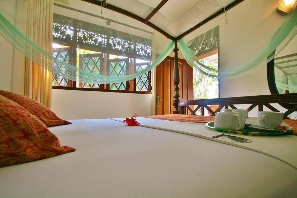 Photo of the whole room, Bed in Sagarika Beach Hotel