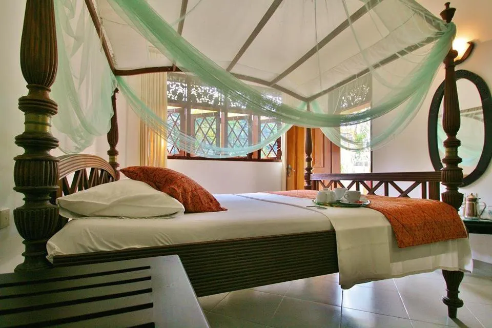 Photo of the whole room, Bed in Sagarika Beach Hotel