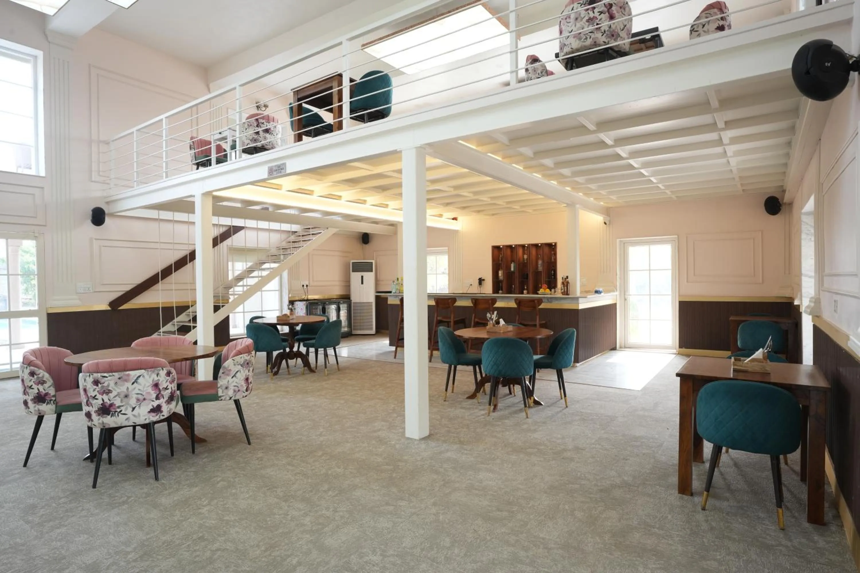 Lounge or bar in Astroport Sariska Treetop by Eight Continents