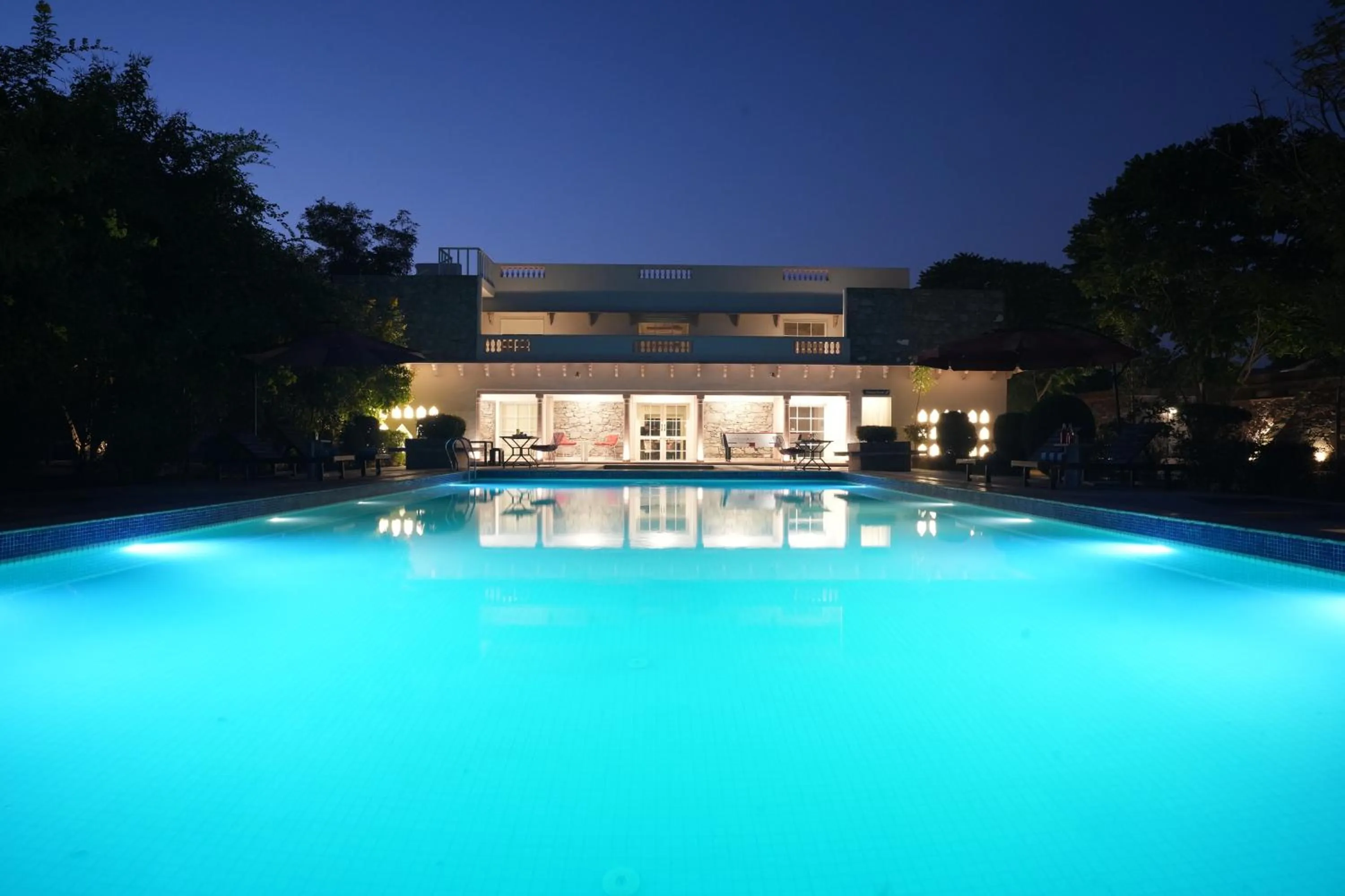 Swimming pool in Astroport Sariska Treetop by Eight Continents