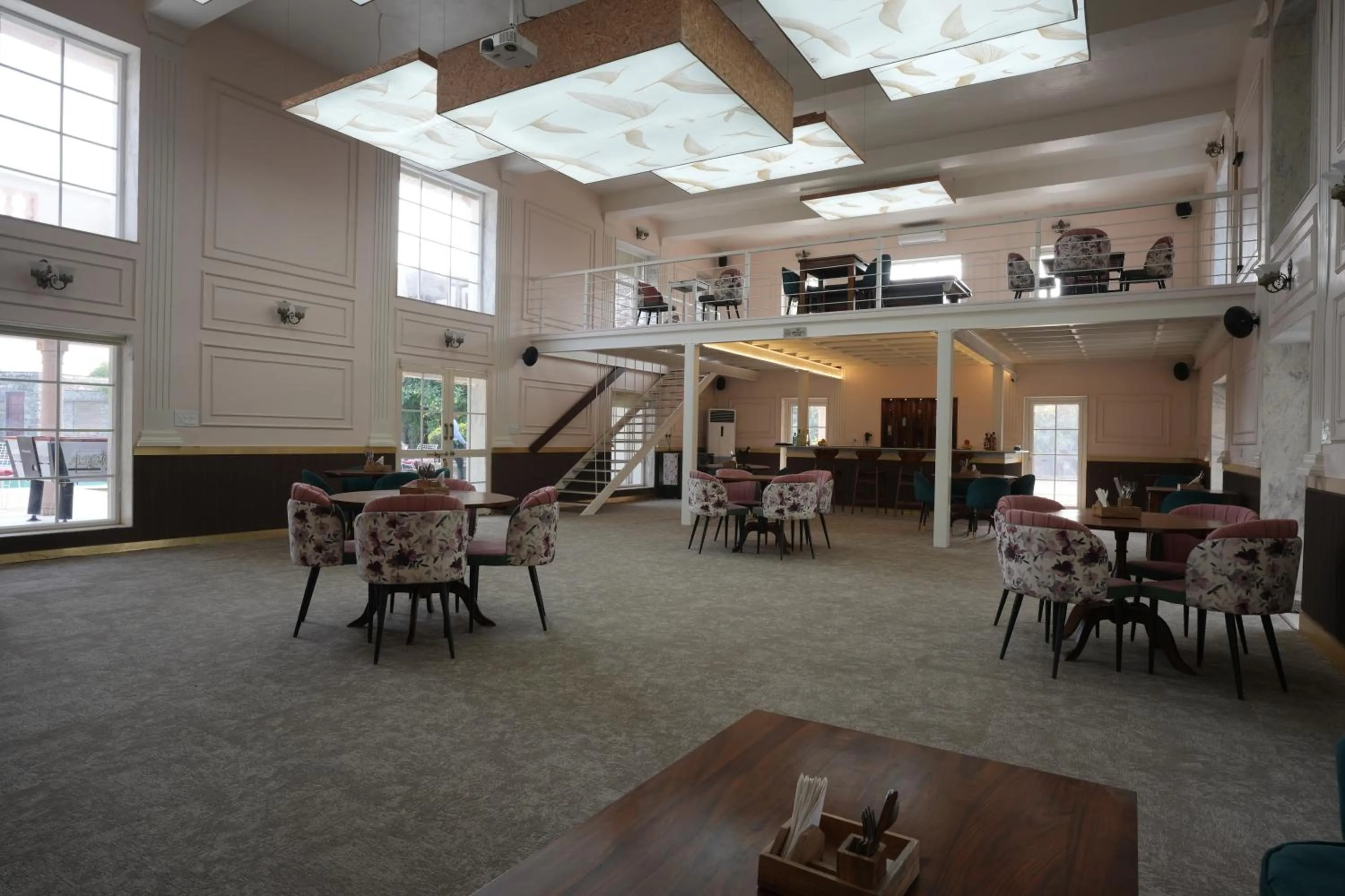 Lounge or bar in Astroport Sariska Treetop by Eight Continents