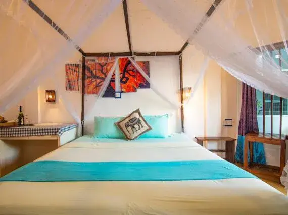 Deluxe Queen Room in Frangipani Beach Villa Deluxe Queen Room in Frangipani Beach Villa