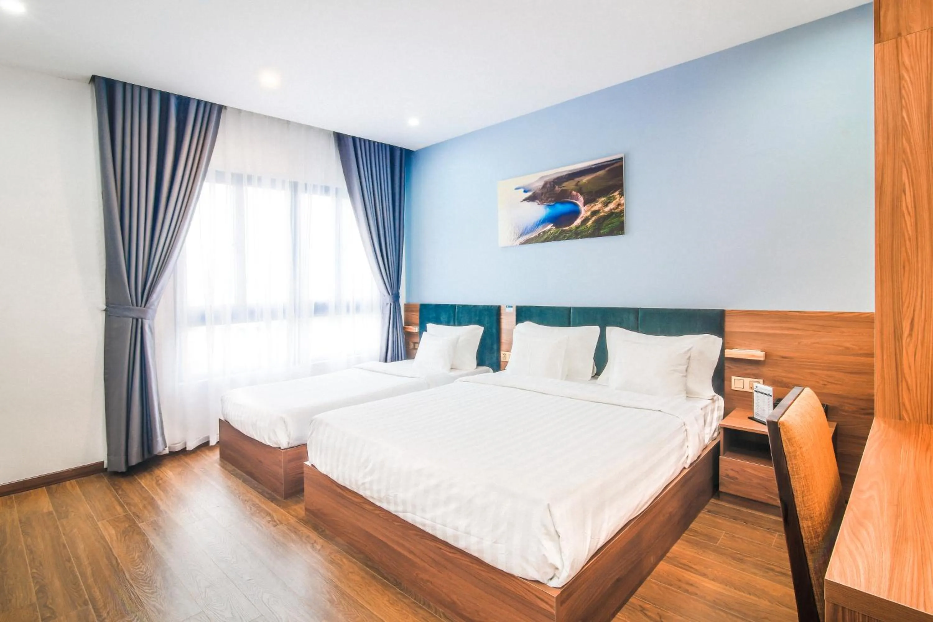 Bed in Grand Lee Hotel