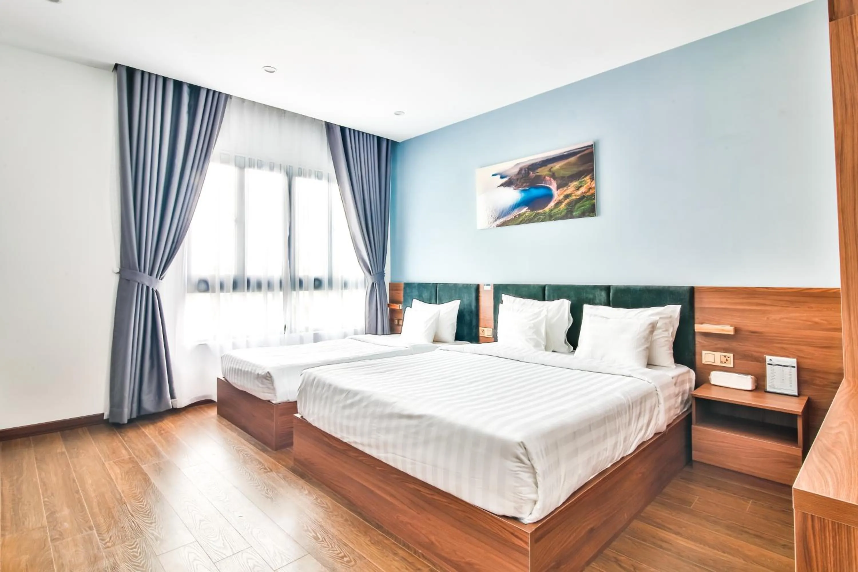 Bed in Grand Lee Hotel