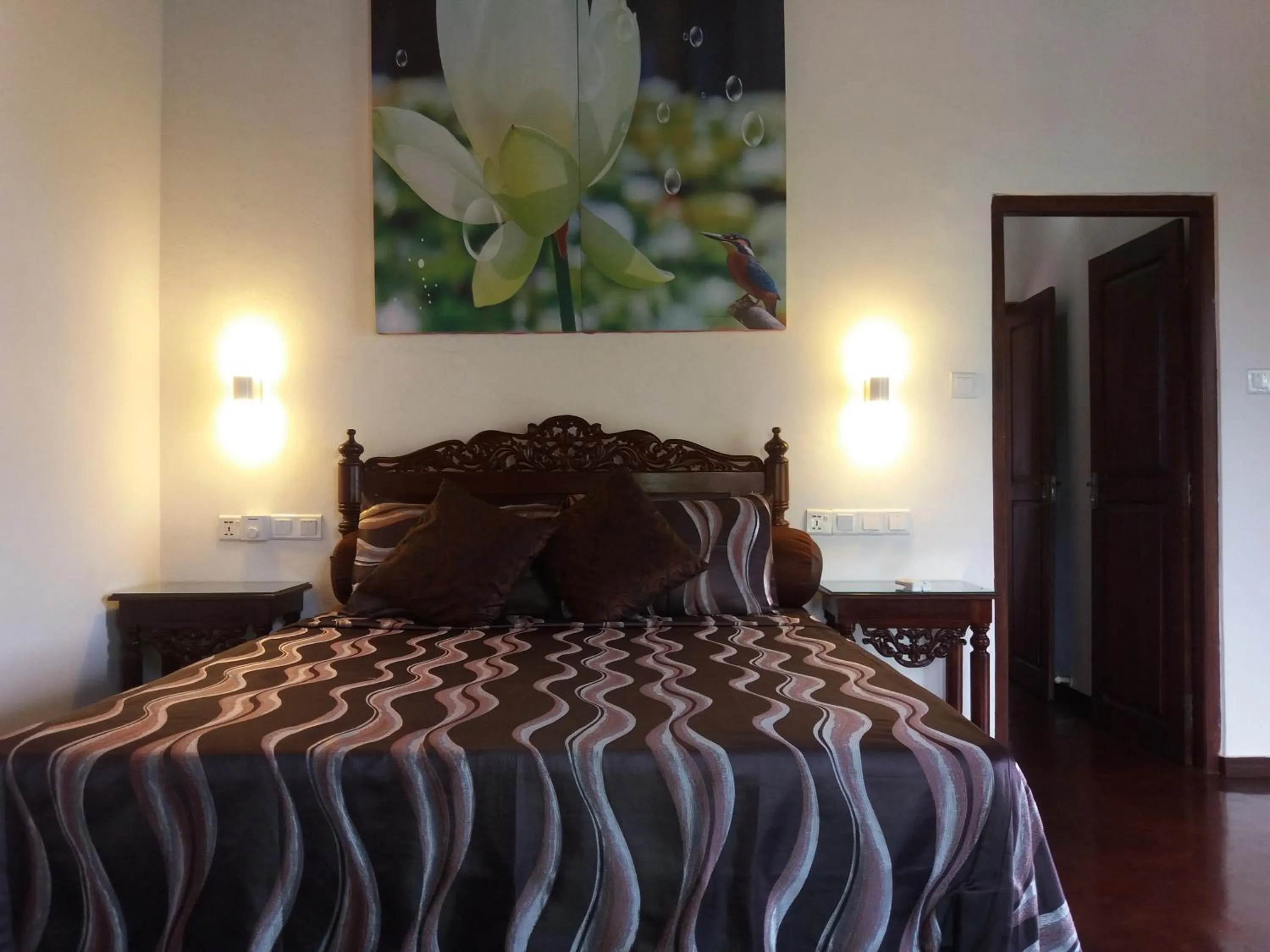 Bed in Asian Jewel Boutique Hotel