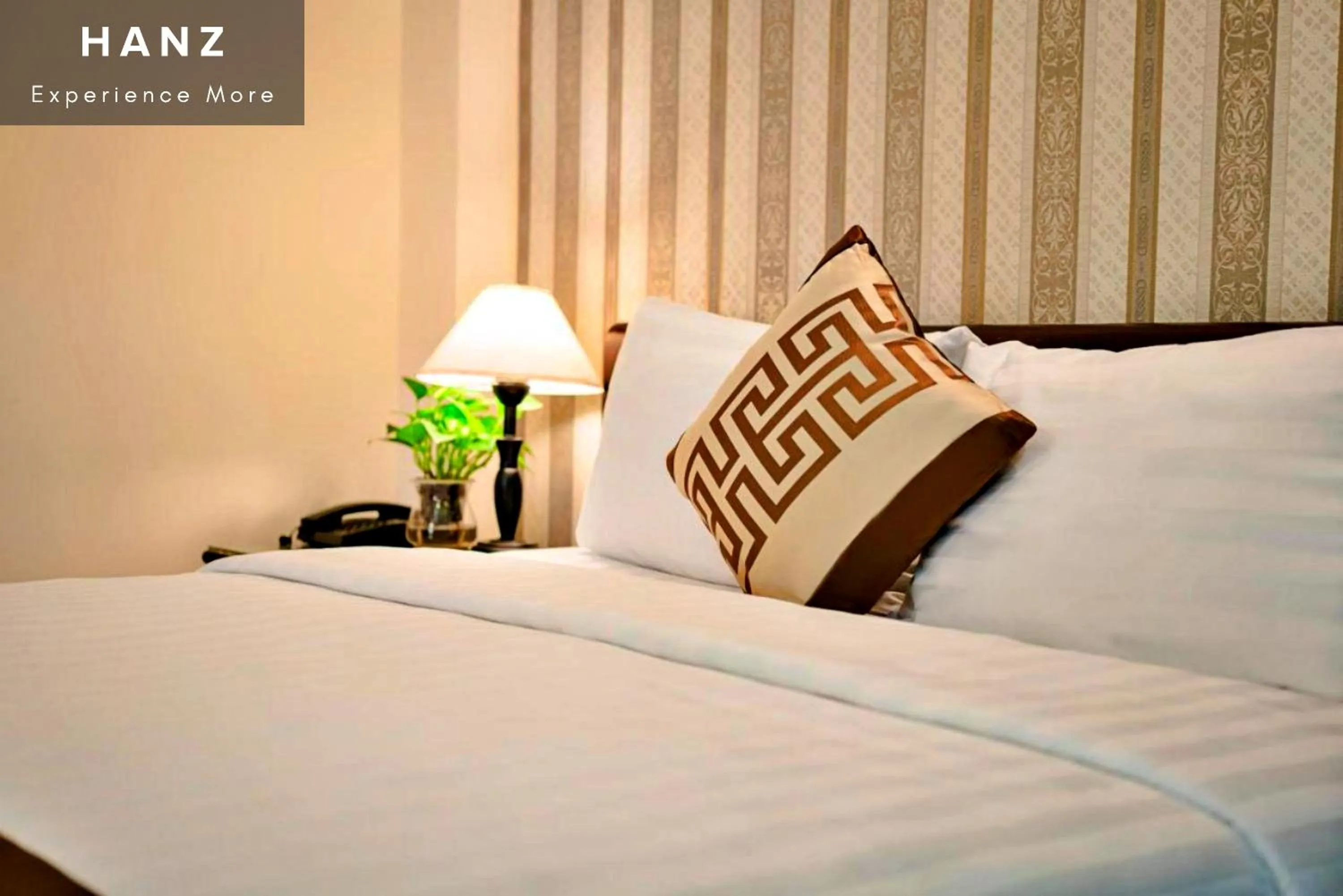 Bed in HANZ Thanh Thu Hotel