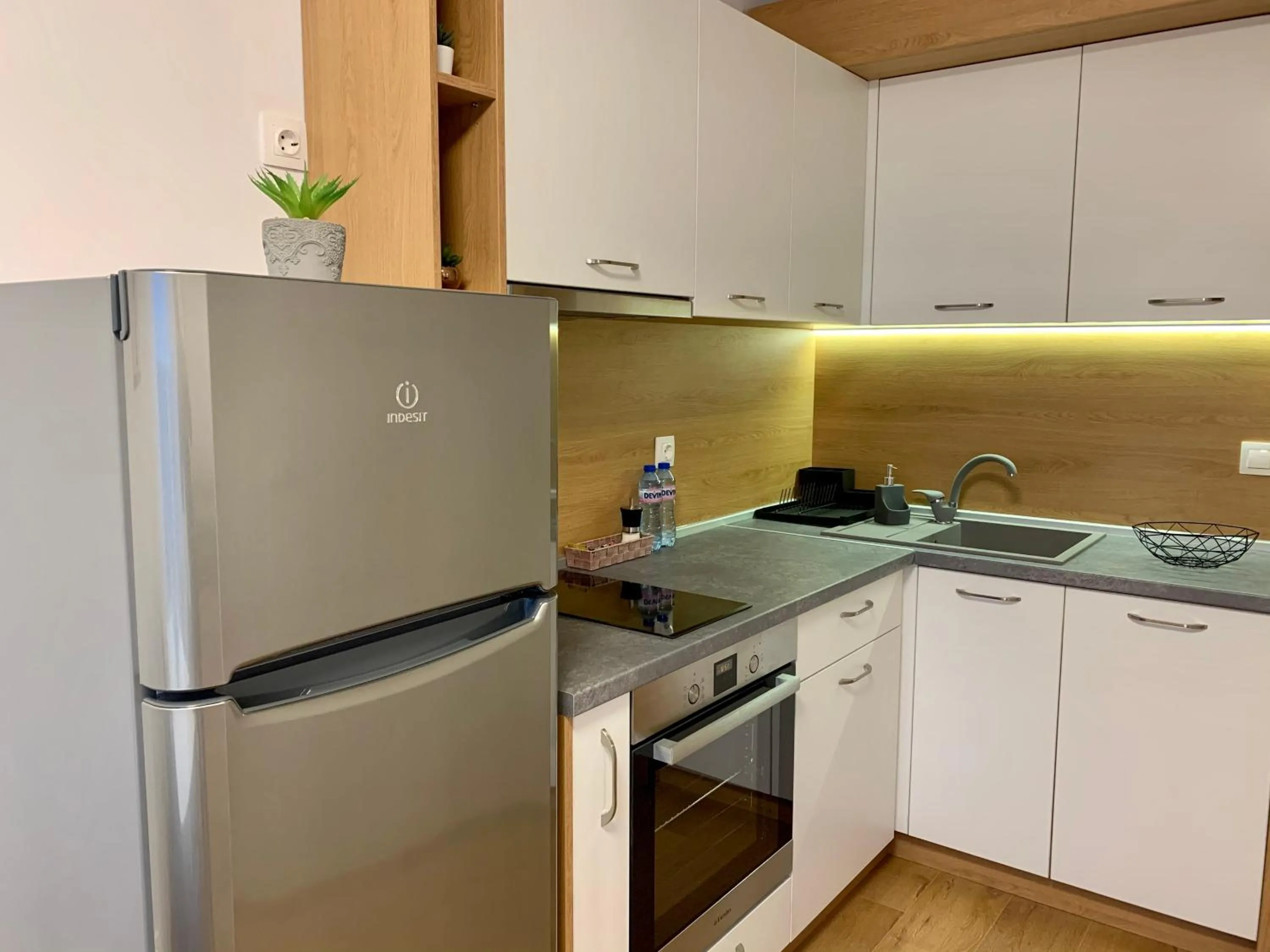 Kitchen or kitchenette in Gardenia Apartments
