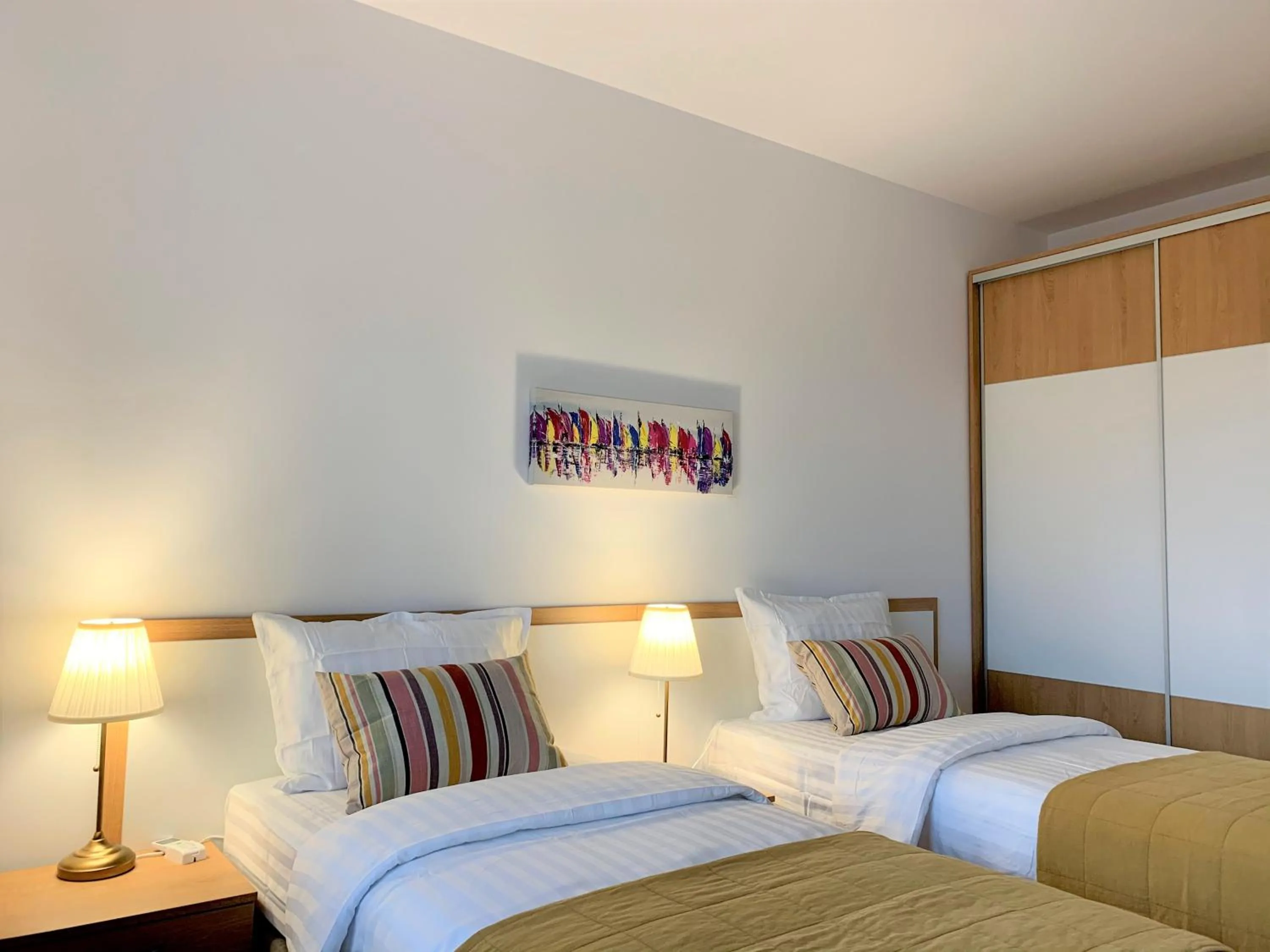 Bed in Gardenia Apartments