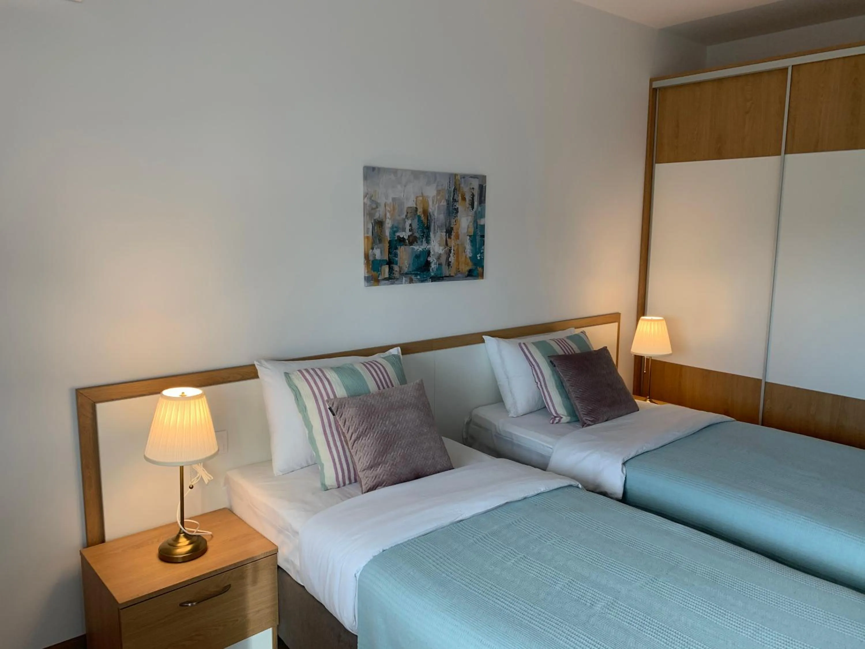 Bed in Gardenia Apartments