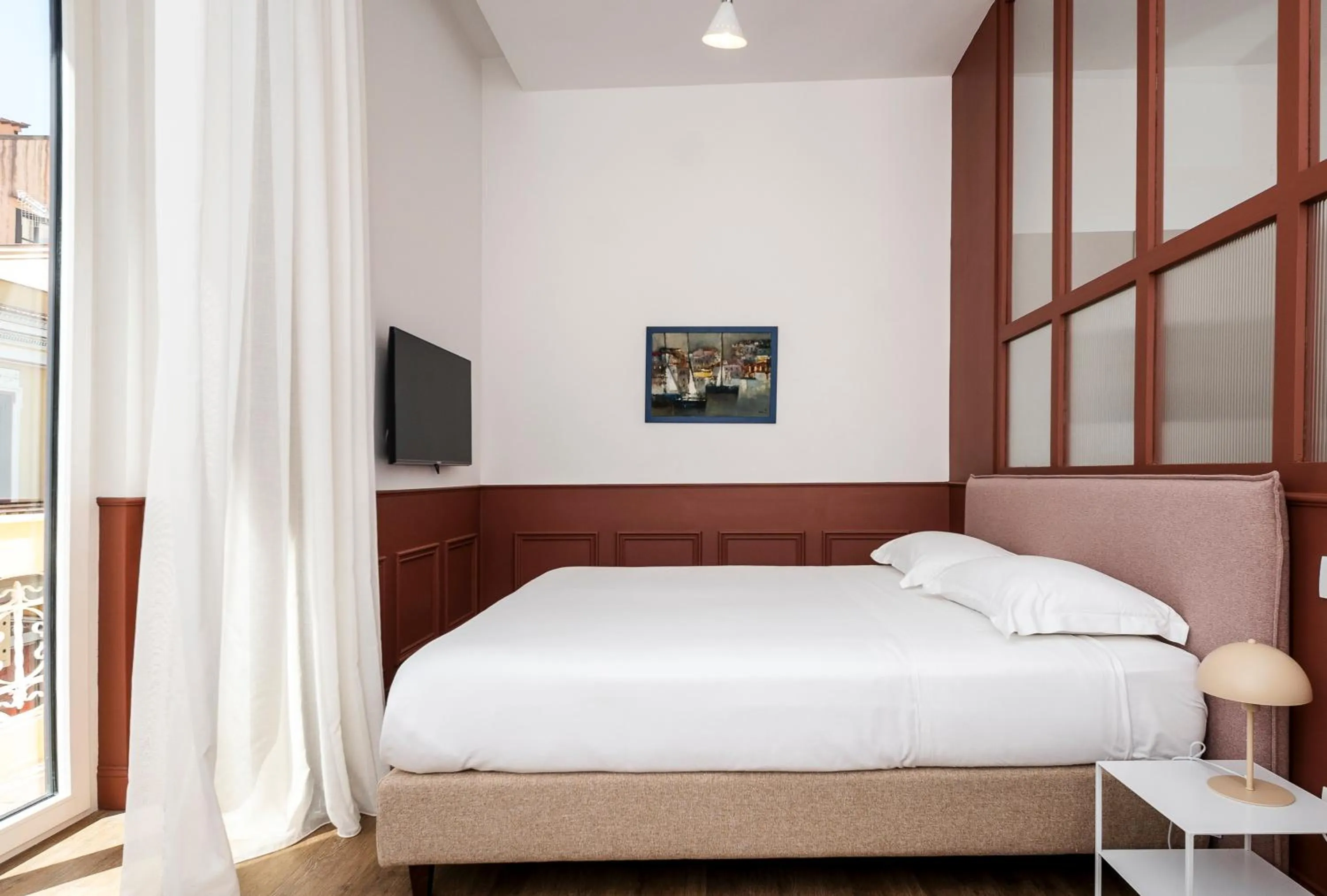 Bed in Corso Italia Suites