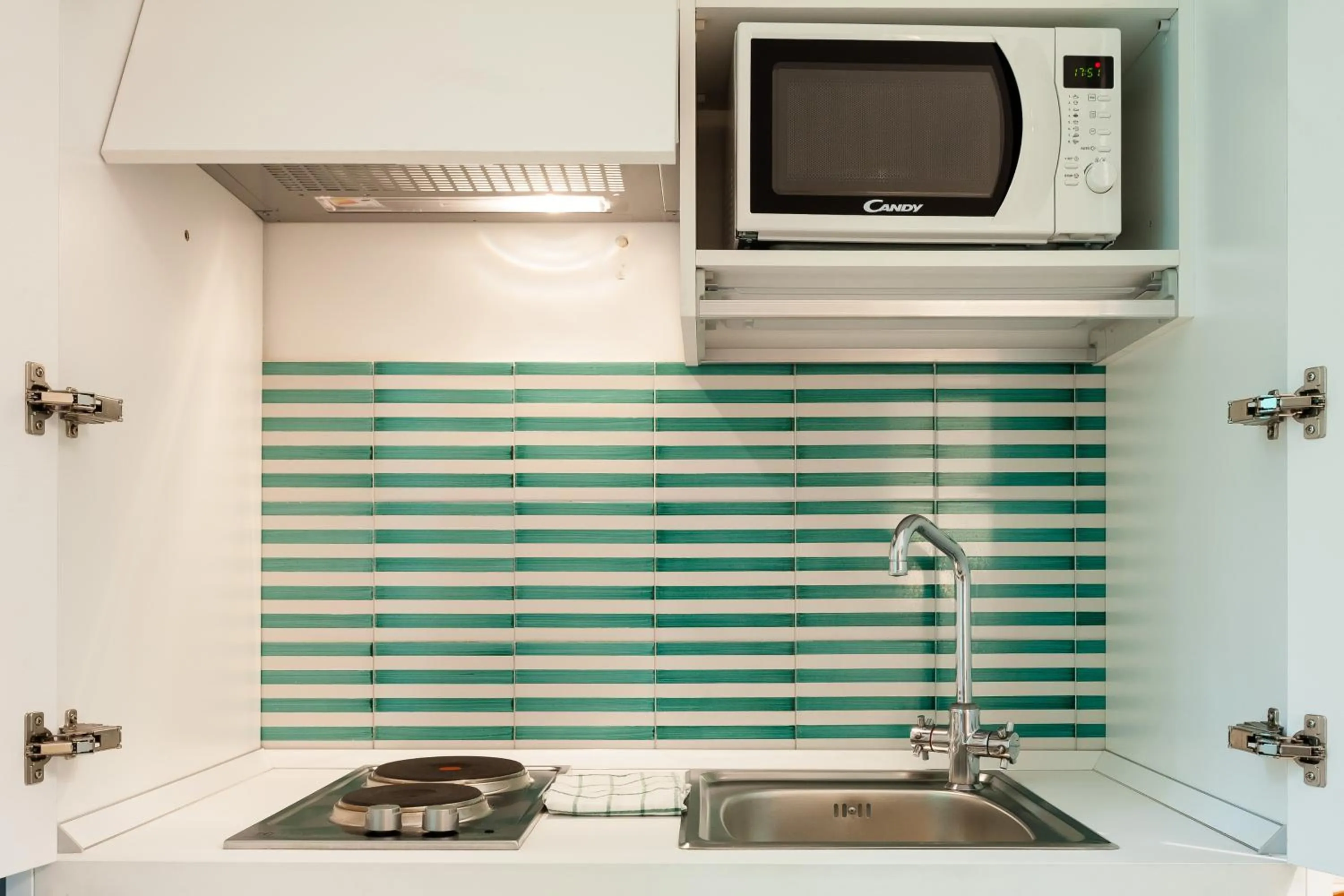 Kitchen or kitchenette in Corso Italia Suites