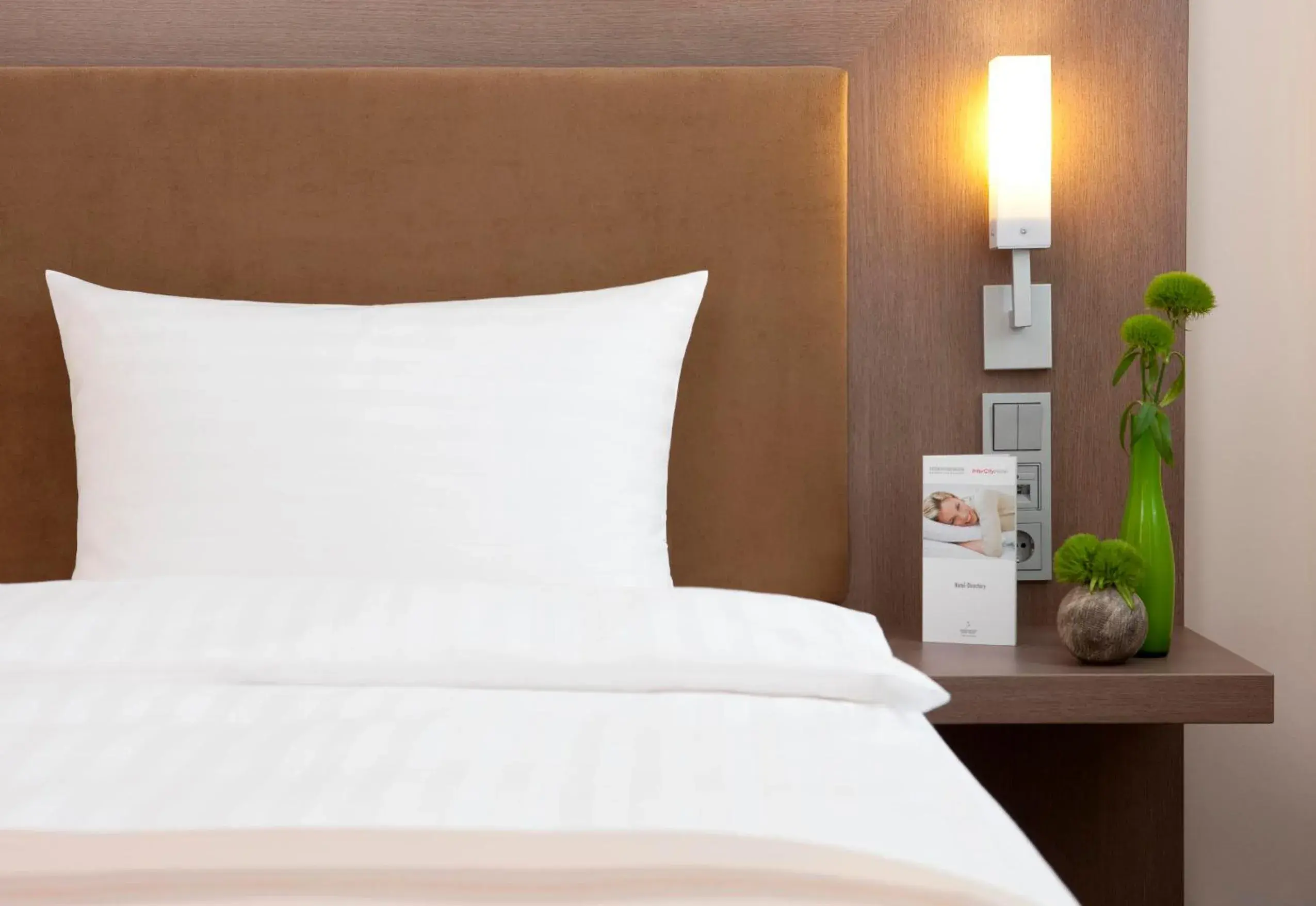 Bed in IntercityHotel Berlin Hauptbahnhof Bed in IntercityHotel Berlin Hauptbahnhof