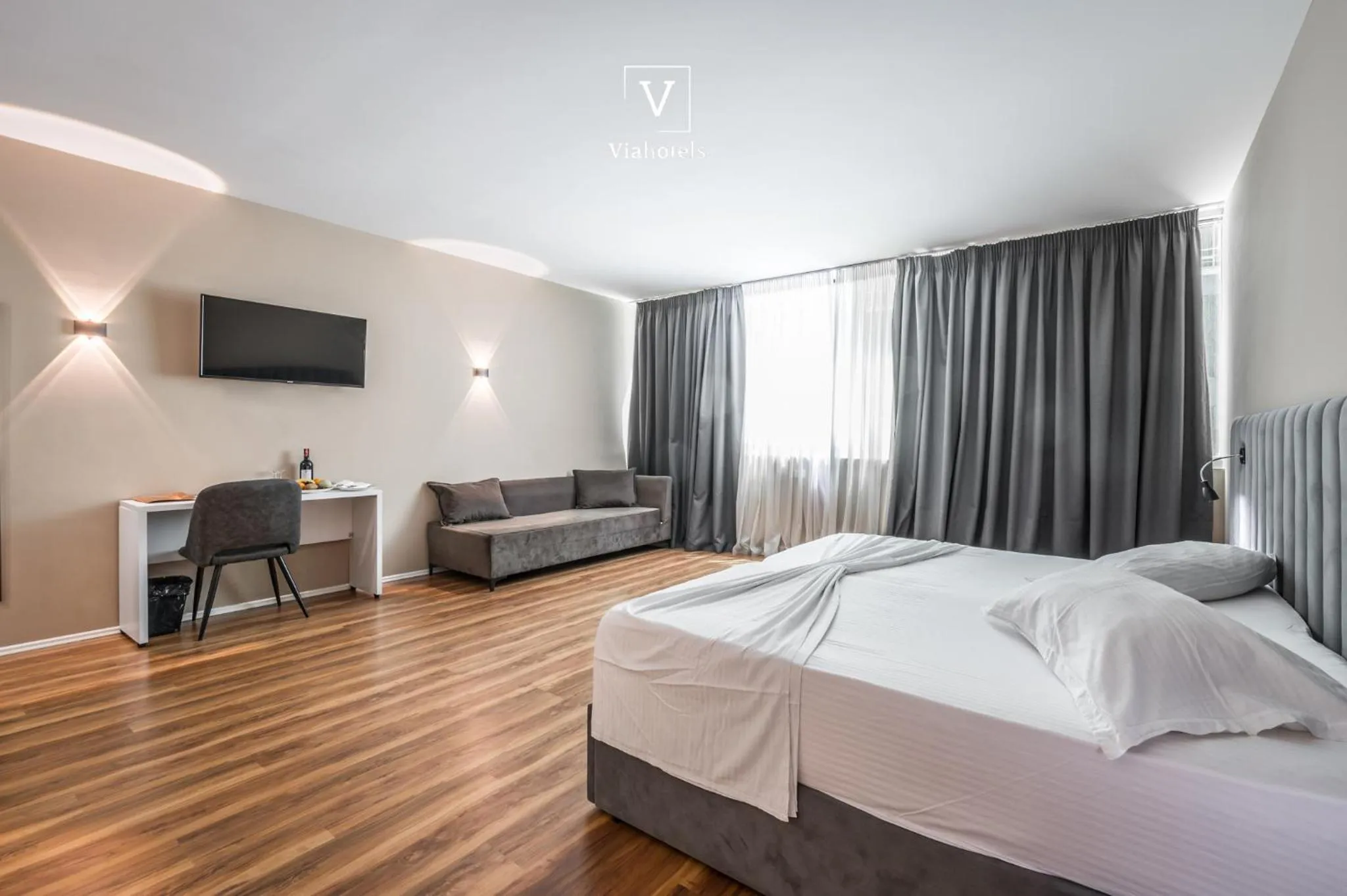 Communal lounge/ TV room, Bed in VH Eurostar Tirana Hotel Congress & Tirana Spa