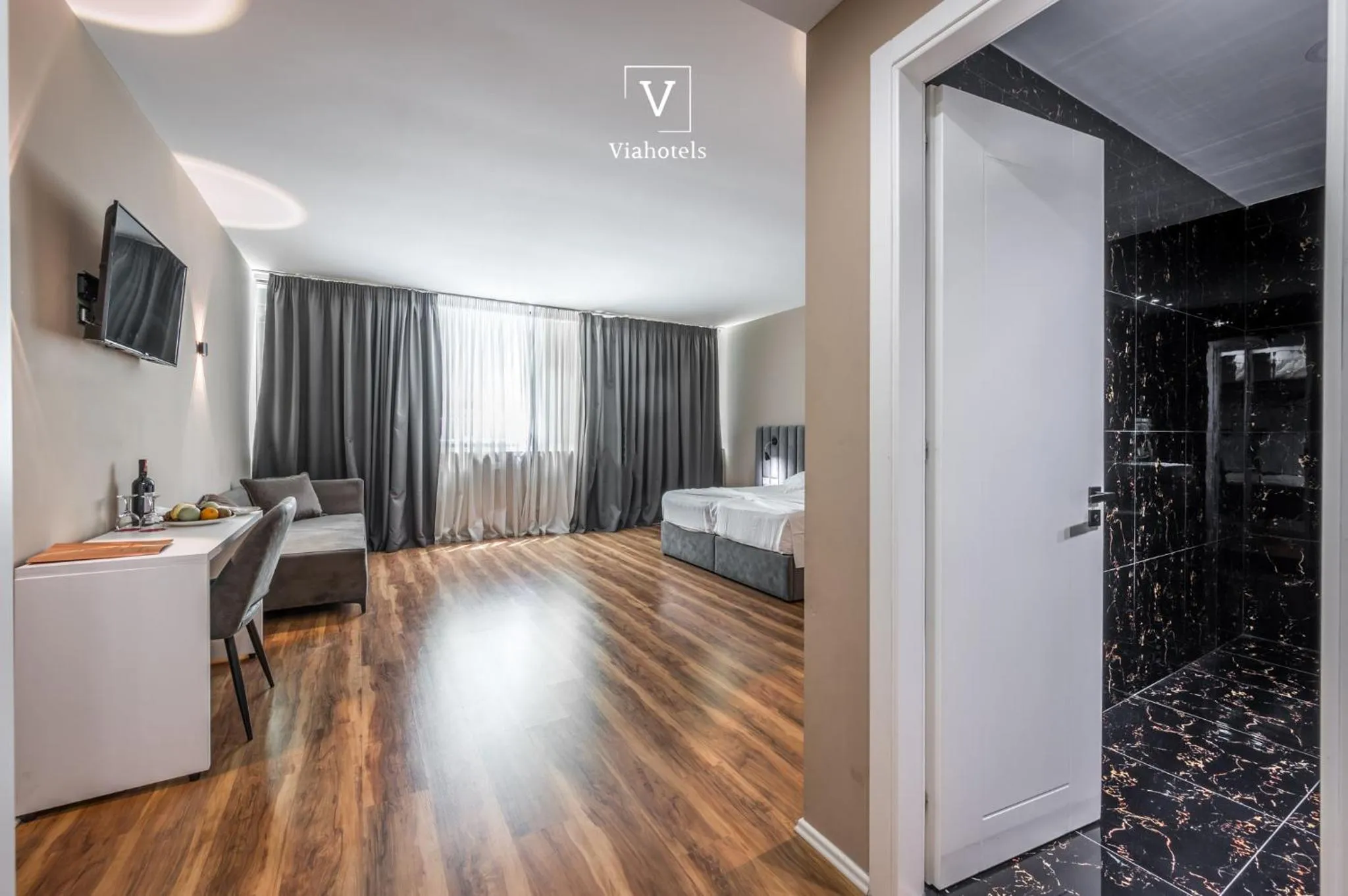 wardrobe, Bed in VH Eurostar Tirana Hotel Congress & Tirana Spa