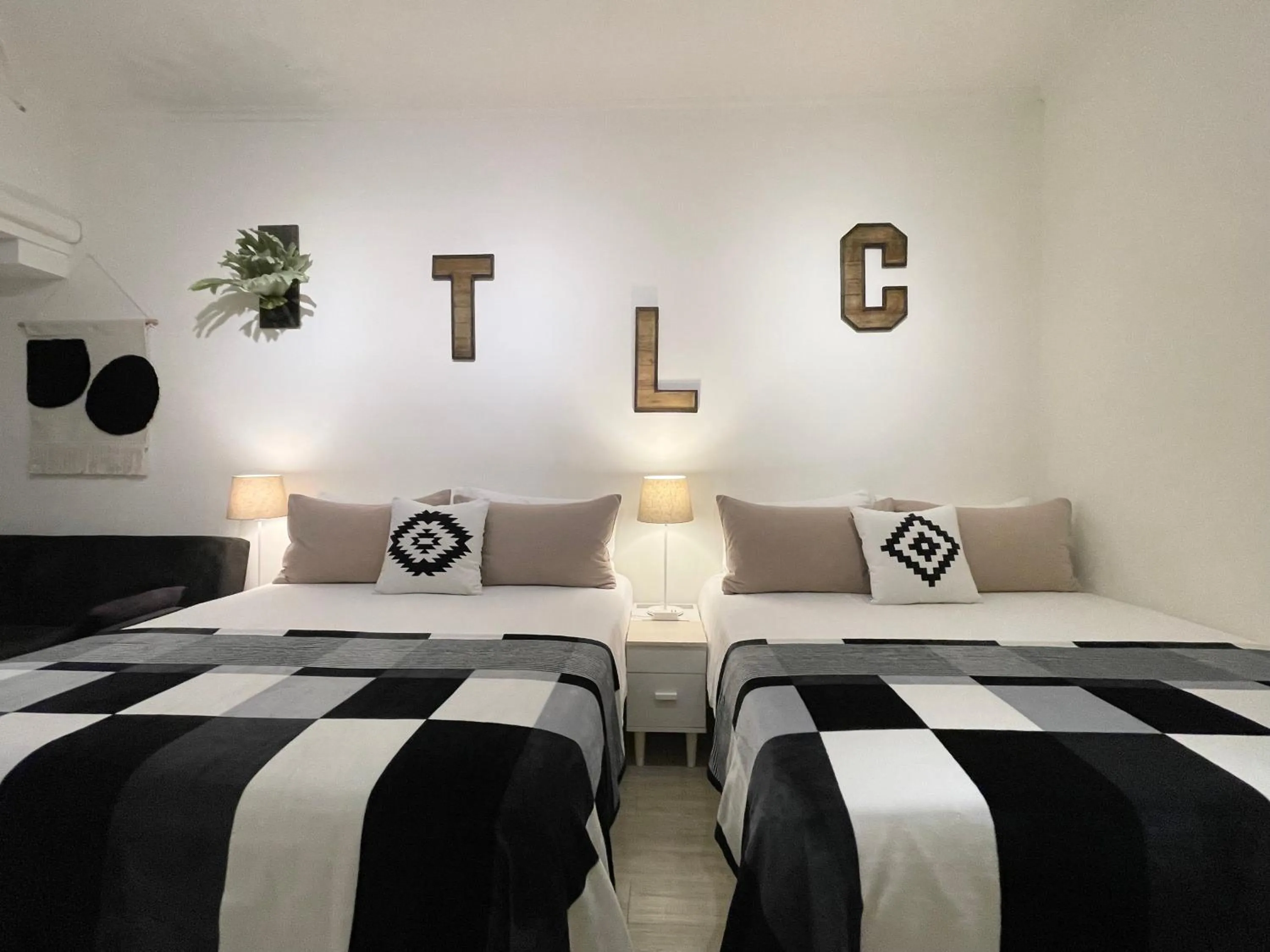 Bed in Urban Abode Apartment 1