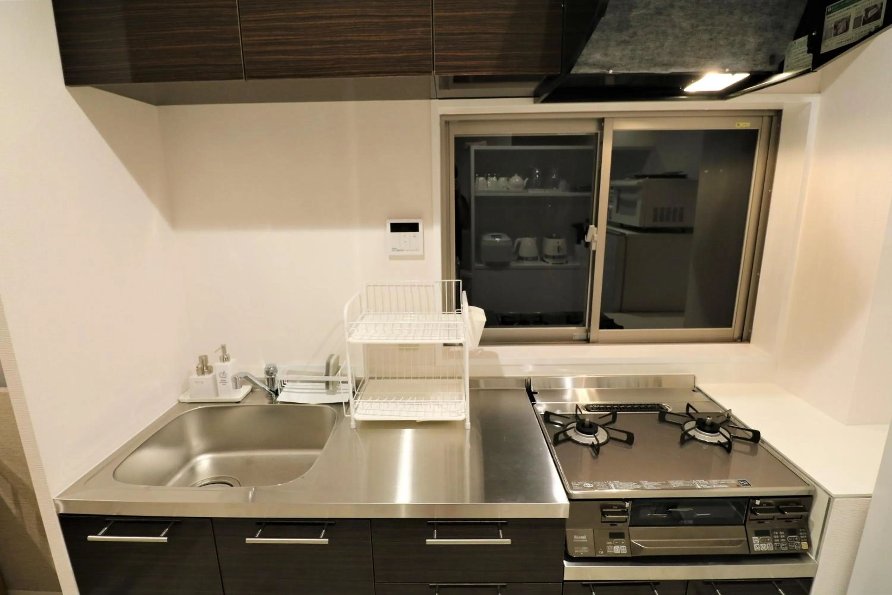 Kitchen or kitchenette in Smart Stay Ito 302