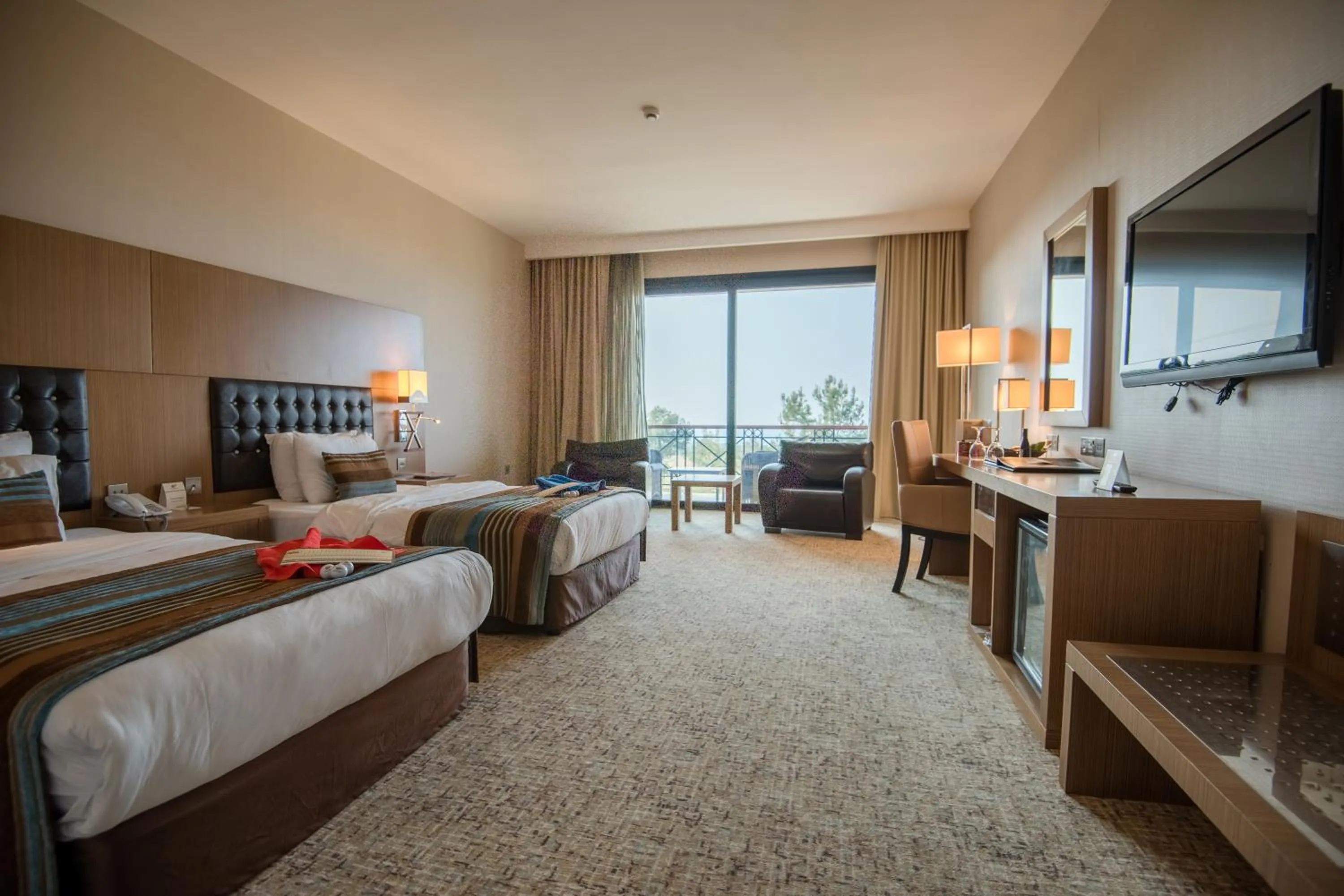 Bed in Korineum Golf & Beach Resort