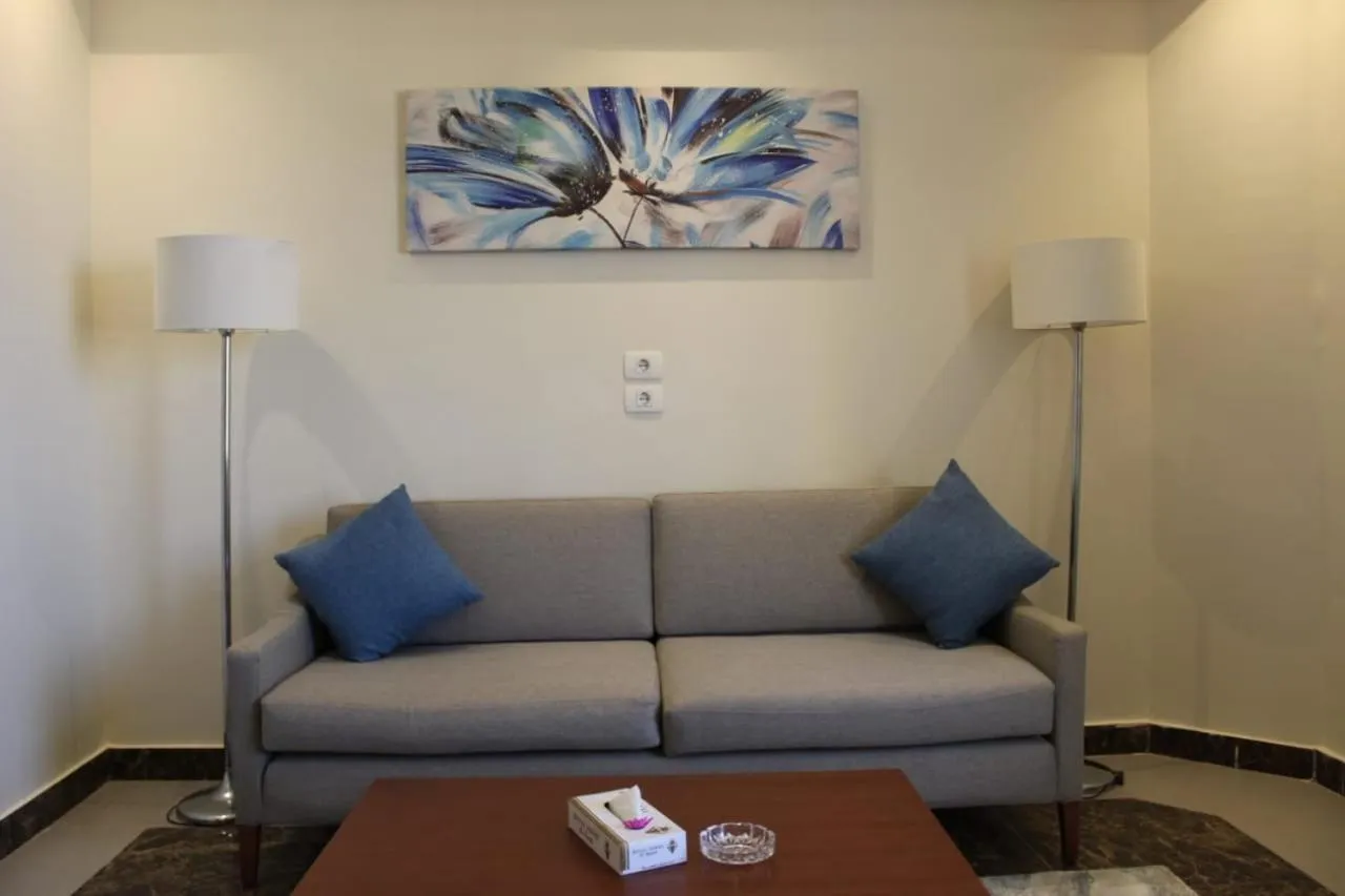 Living room in Royal Jewel Al Raml Hotel