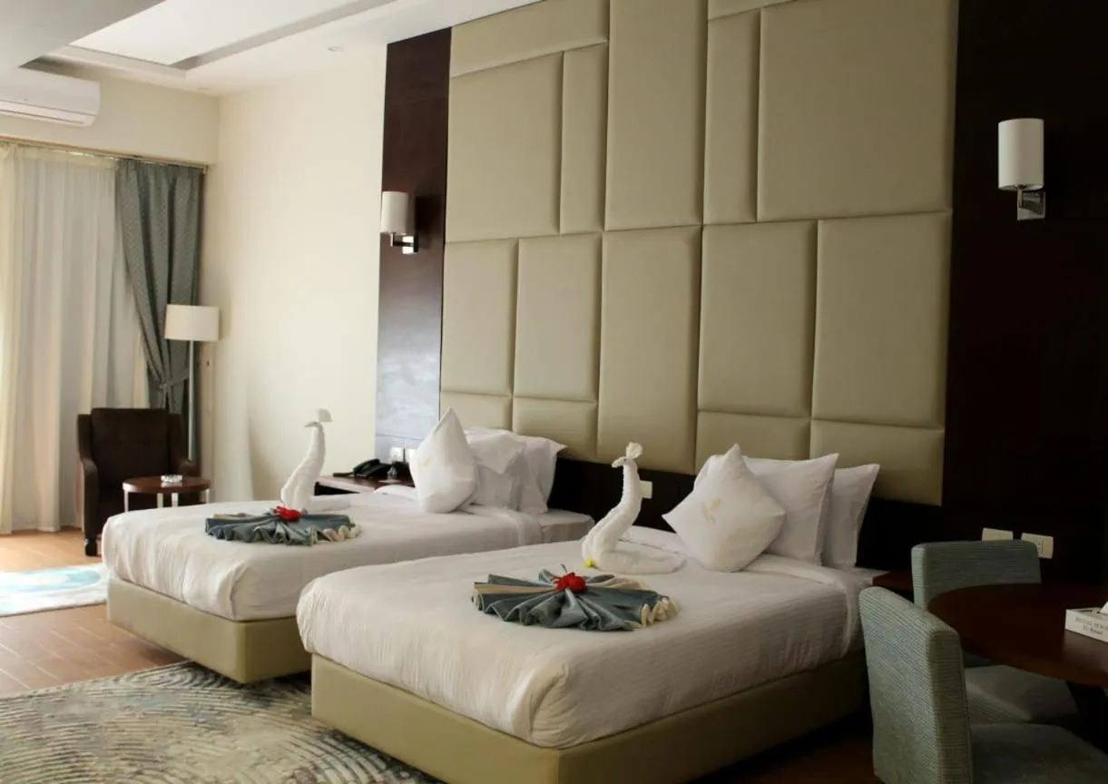 Bedroom, Bed in Royal Jewel Al Raml Hotel