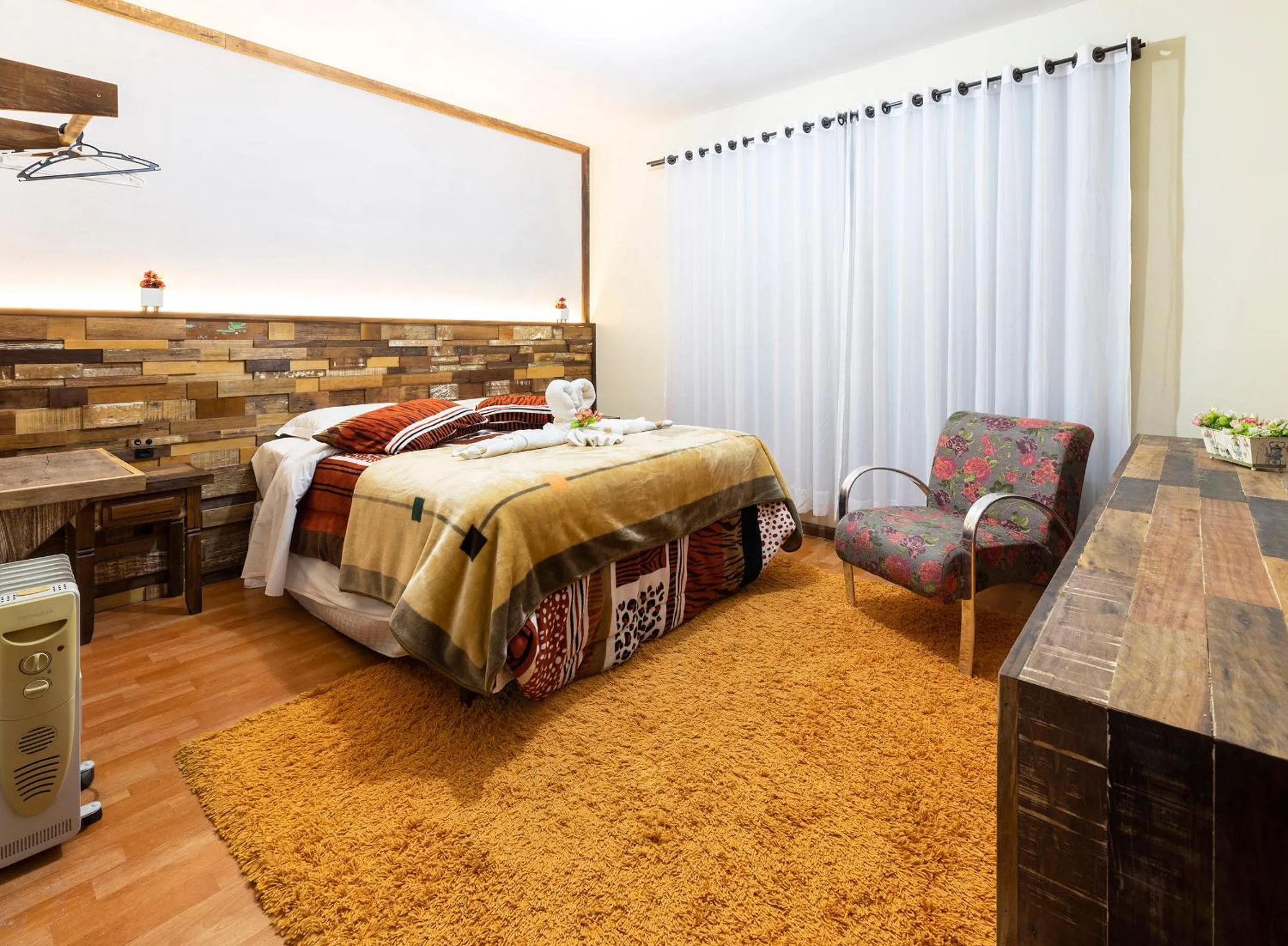 Bed in Pousada Kaluana