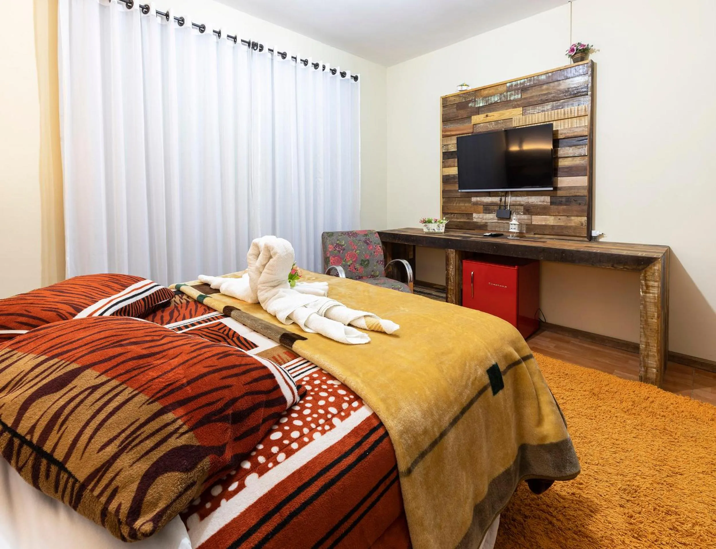 Bed in Pousada Kaluana