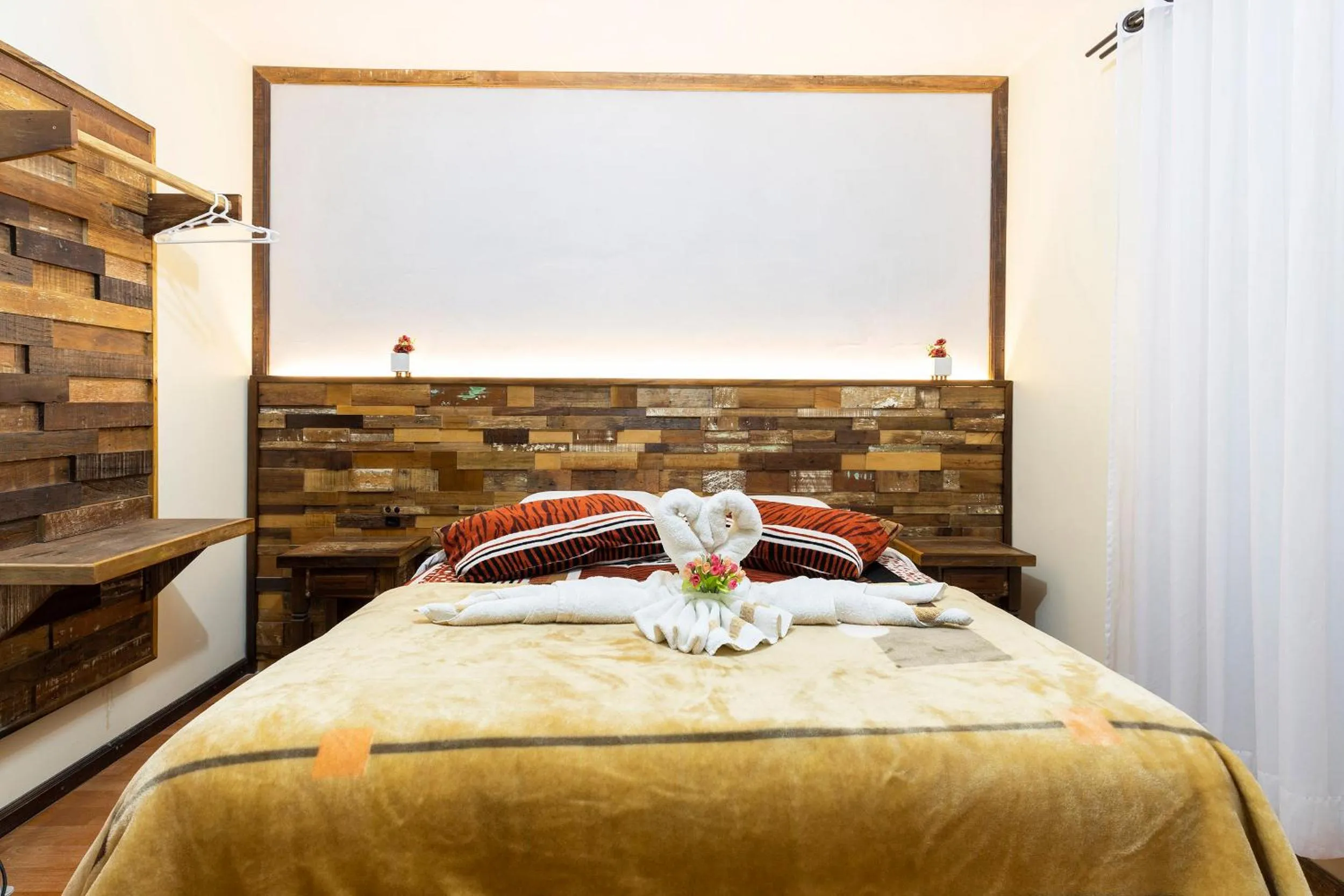Bed in Pousada Kaluana