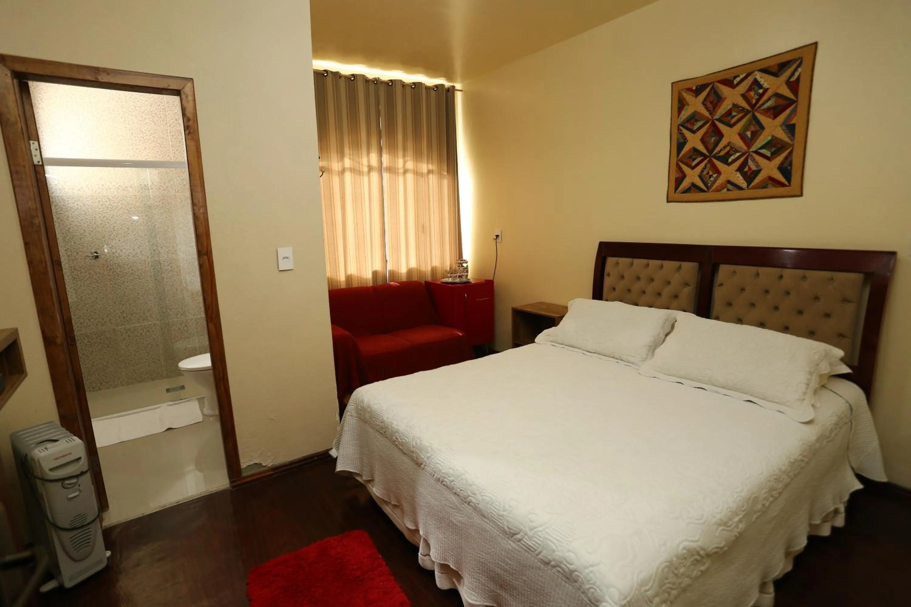 Bed in Pousada Kaluana
