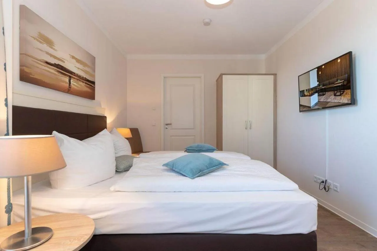 Bed in Aparthotel Waterkant Suites - Fewos am Meer mit SPA