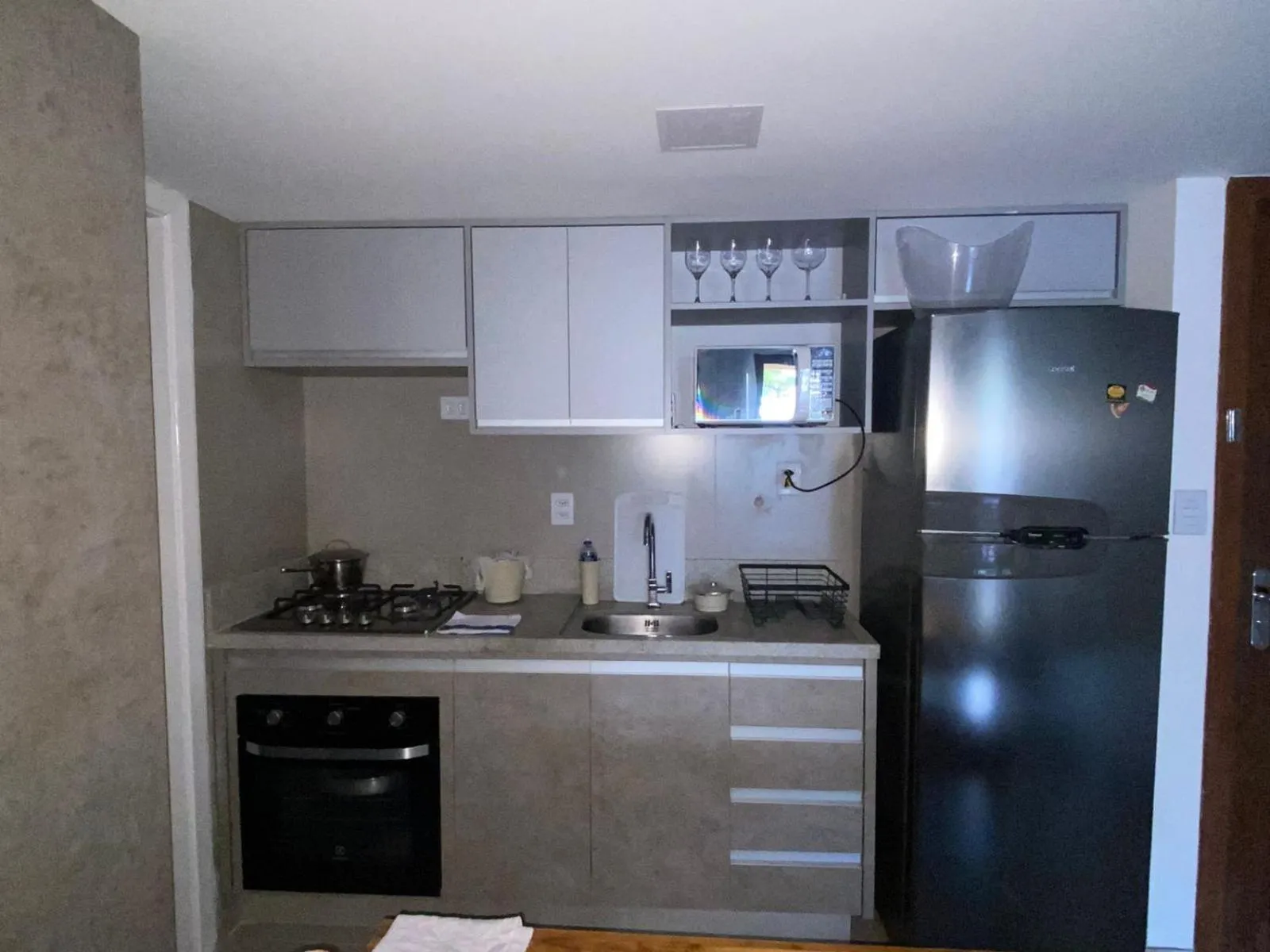 Communal kitchen in Apartamento Enseada Praia do Forte